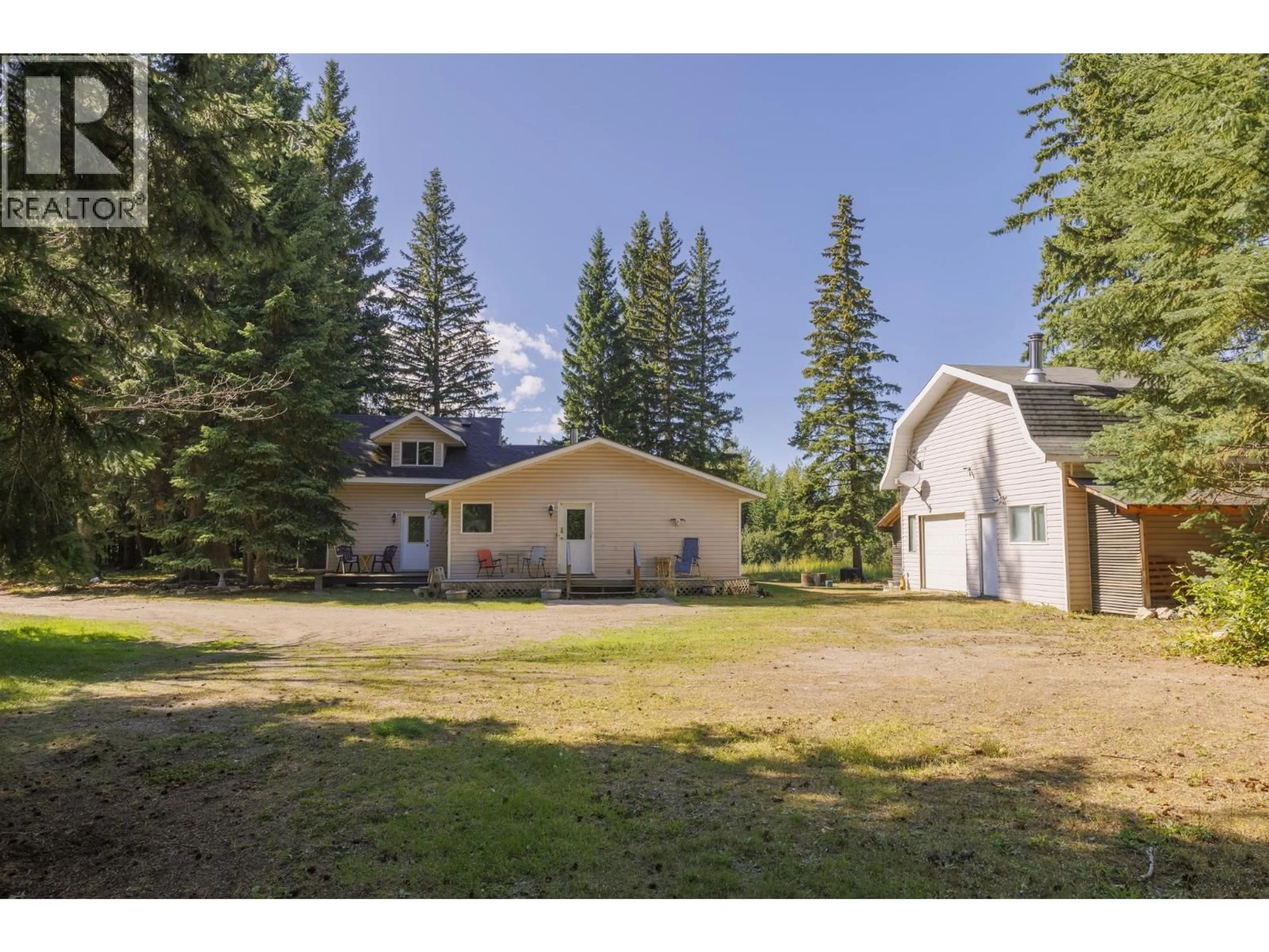 A pic from outside/outdoor area/front of a property/back of a property/a pic from drone, mountain view for 1475 DORVAL ROAD, McBride British Columbia V0J2E0
