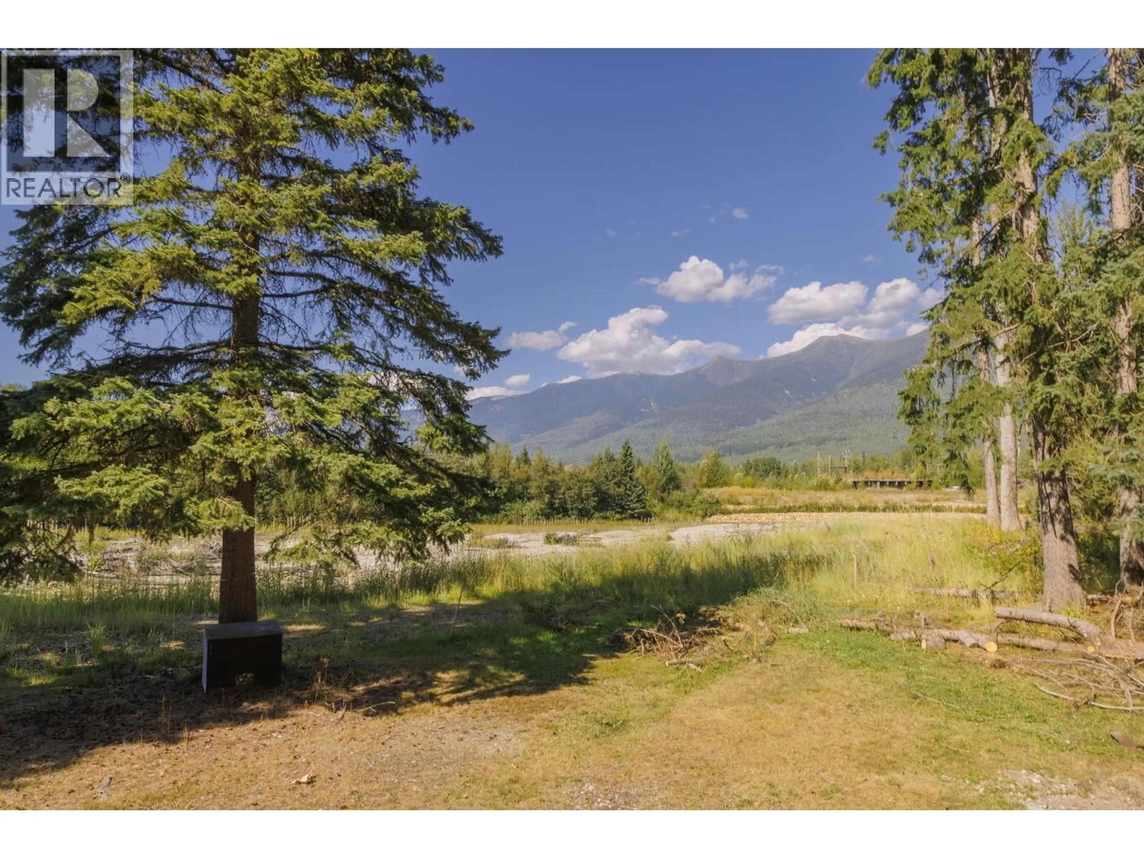 A pic from outside/outdoor area/front of a property/back of a property/a pic from drone, mountain view for 1475 DORVAL ROAD, McBride British Columbia V0J2E0