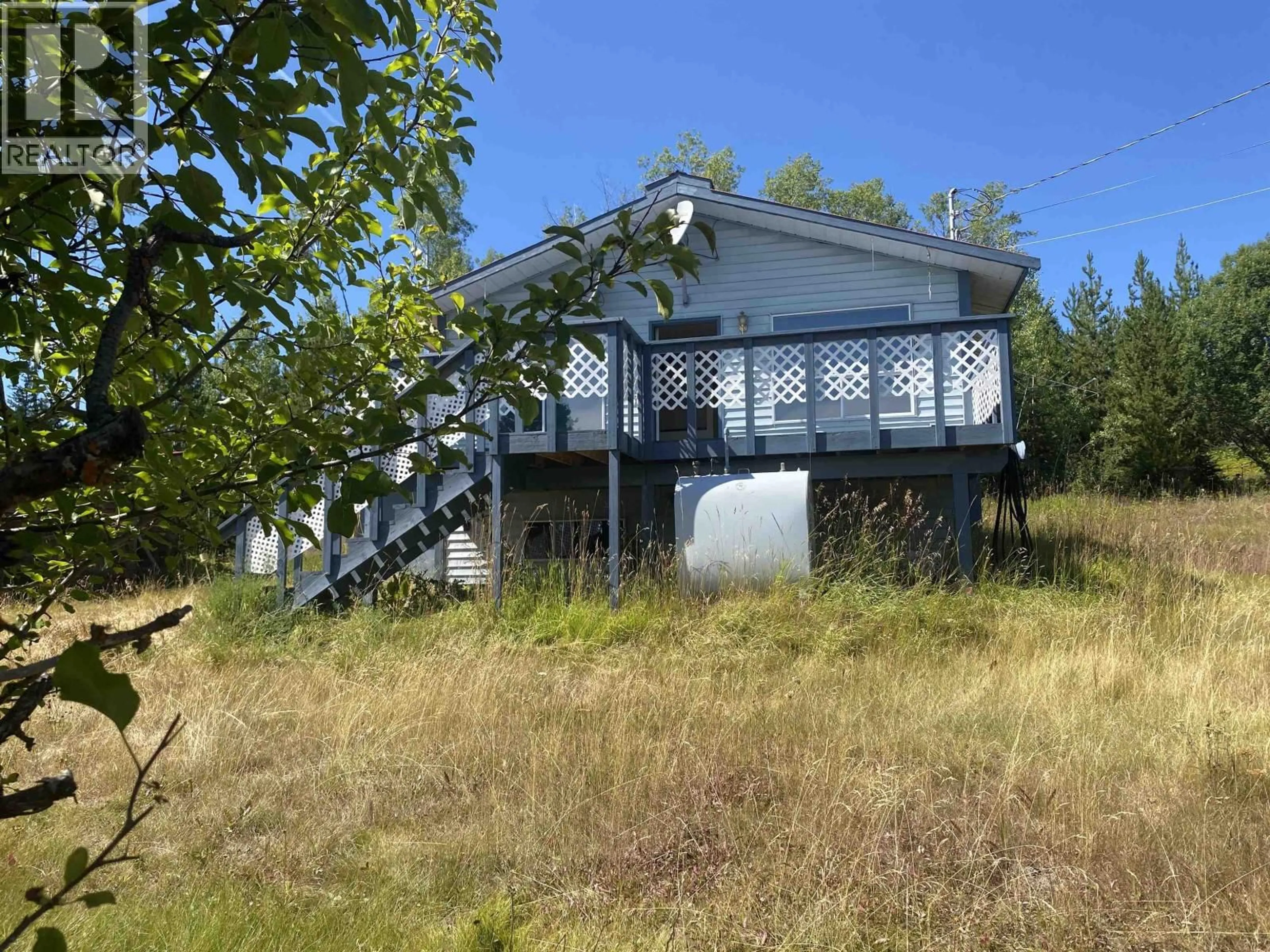 A pic from outside/outdoor area/front of a property/back of a property/a pic from drone, water/lake/river/ocean view for 7188 GROSSETT ROAD, Bridge Lake British Columbia V0K1X2