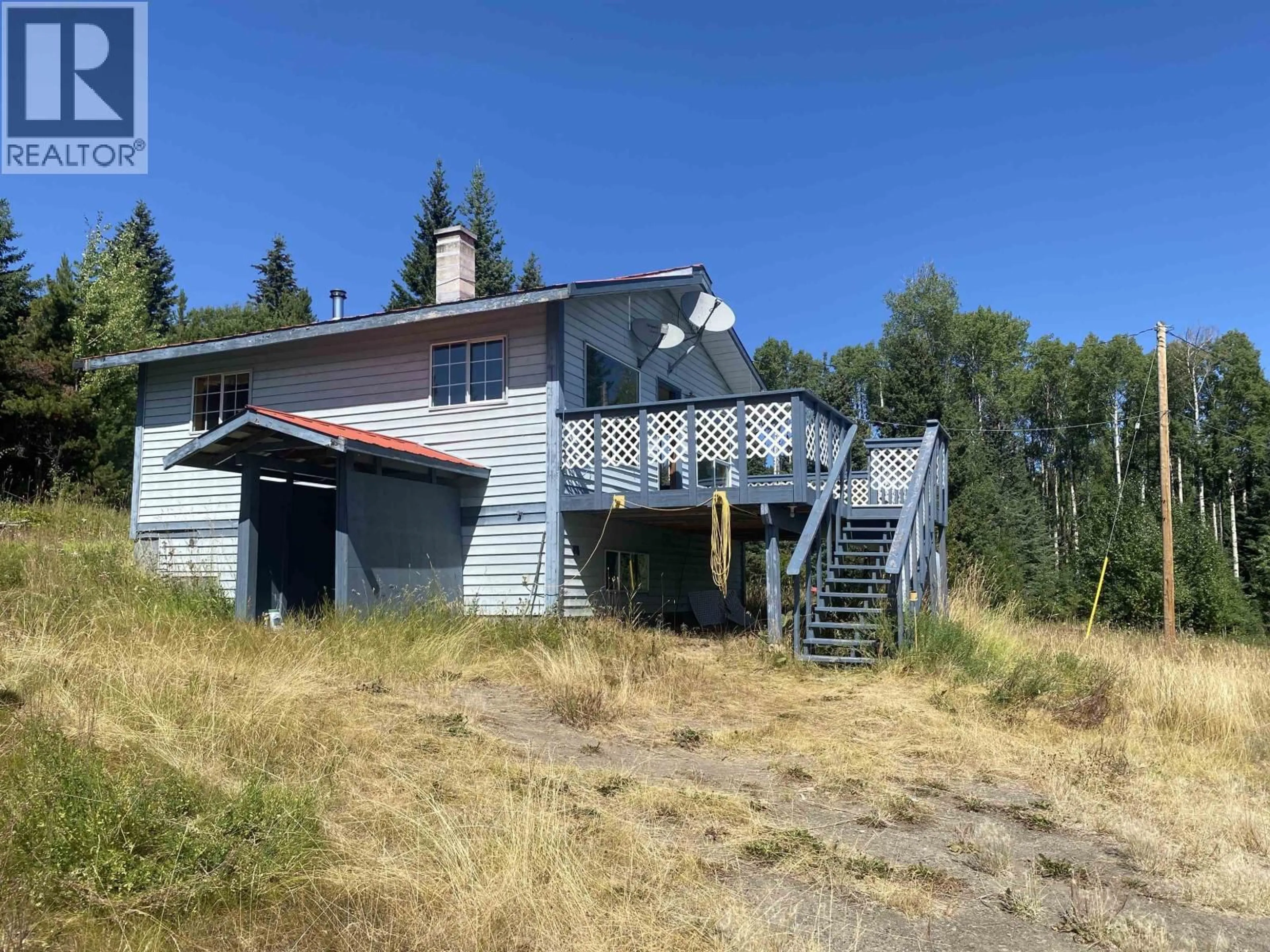 A pic from outside/outdoor area/front of a property/back of a property/a pic from drone, unknown for 7188 GROSSETT ROAD, Bridge Lake British Columbia V0K1X2