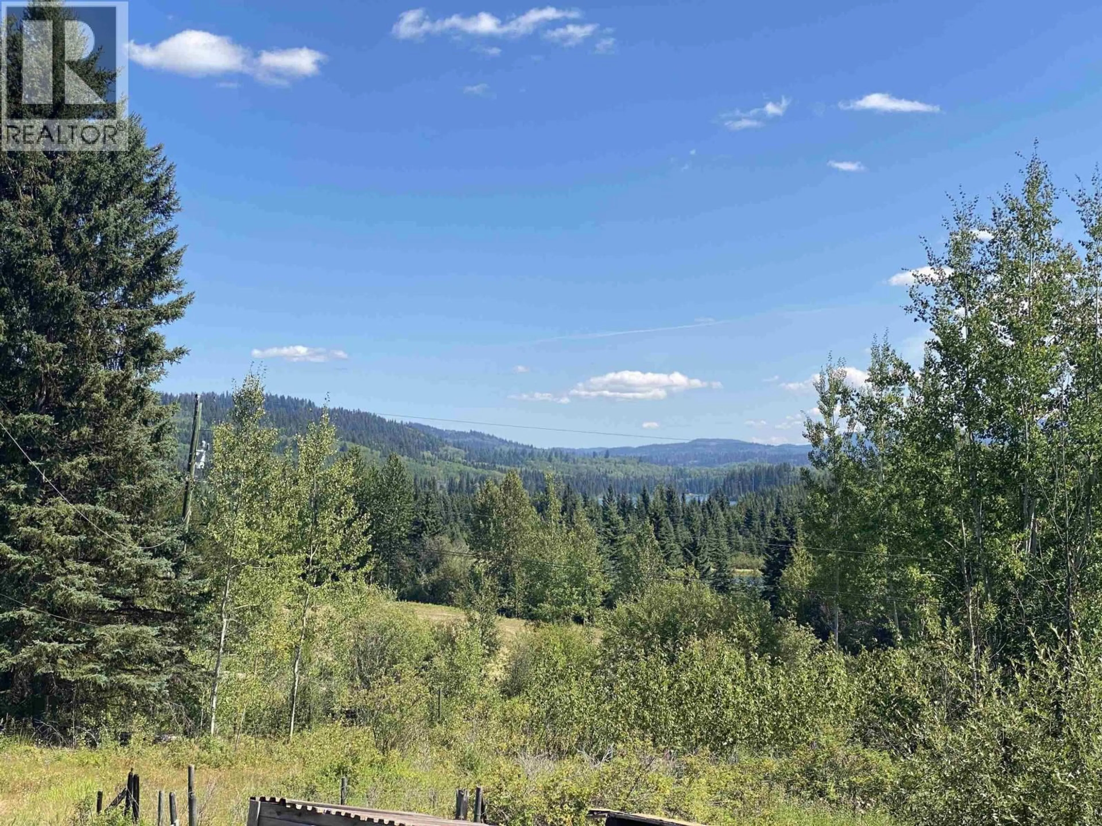 A pic from outside/outdoor area/front of a property/back of a property/a pic from drone, forest/trees view for 7188 GROSSETT ROAD, Bridge Lake British Columbia V0K1X2