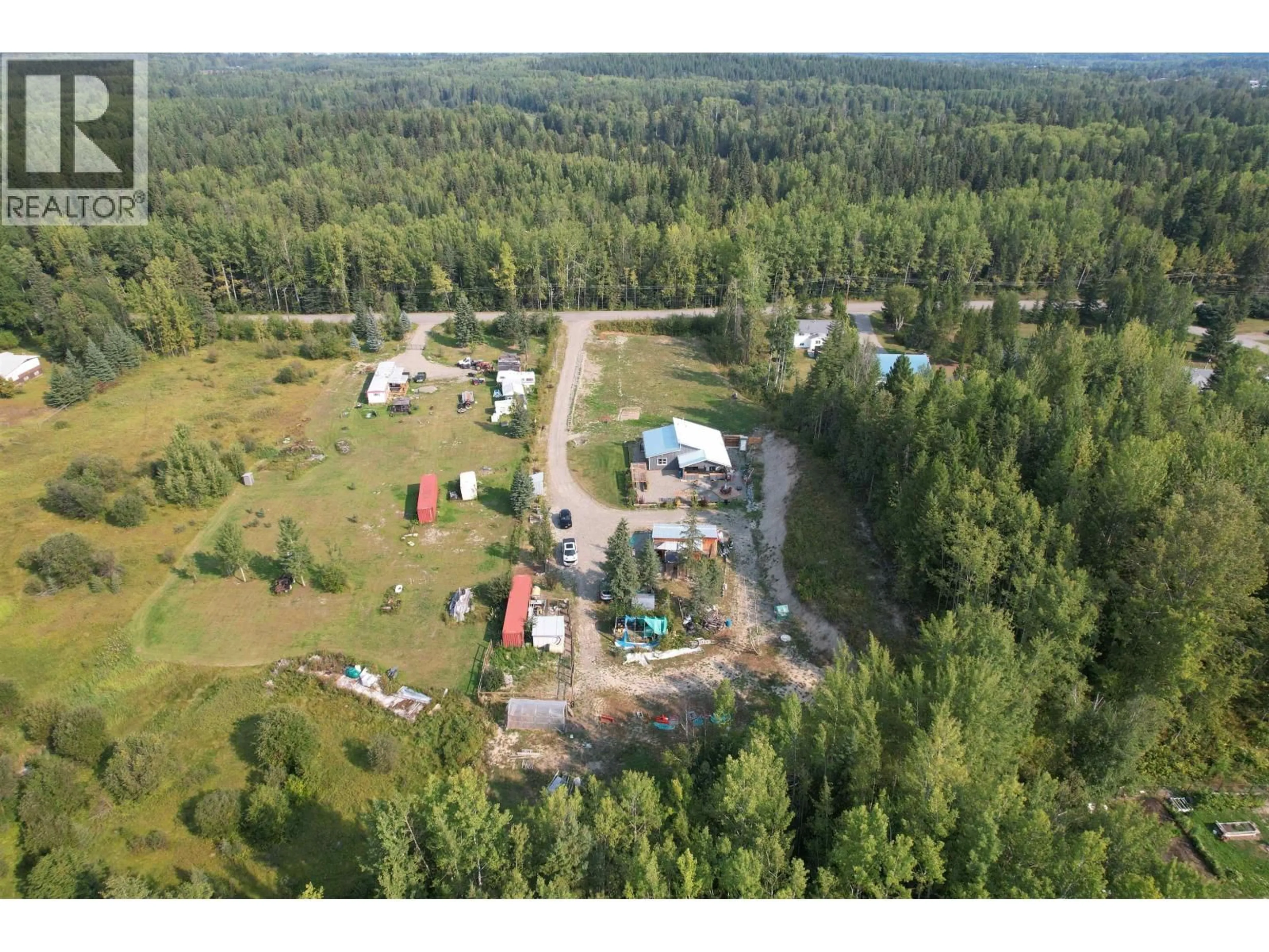 A pic from outside/outdoor area/front of a property/back of a property/a pic from drone, forest/trees view for 1962 SALES ROAD, Quesnel British Columbia V2J6C1