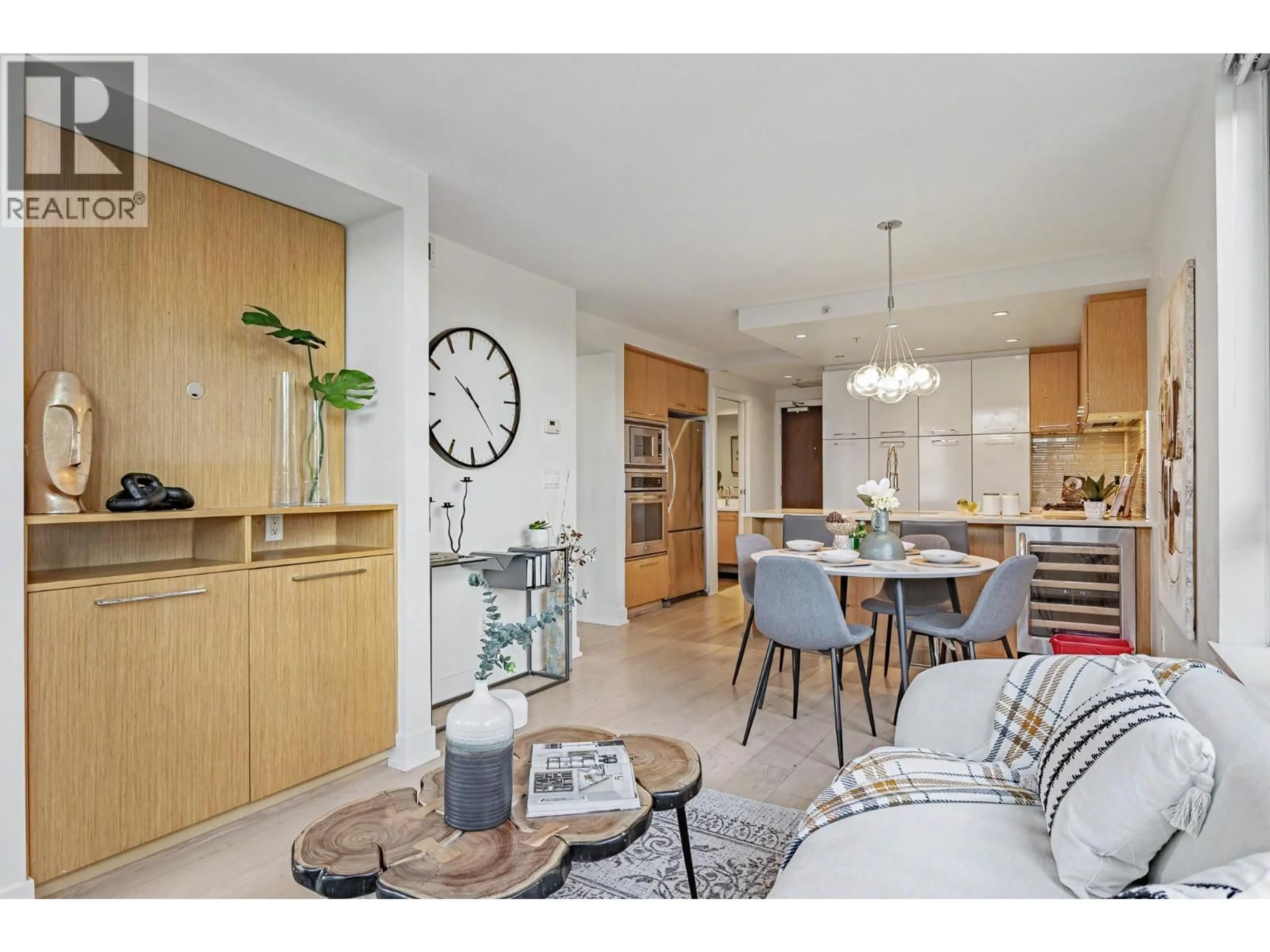 Open concept kitchen, wood/laminate floor for 207 - 1680 4TH AVENUE, Vancouver British Columbia V6J0B7