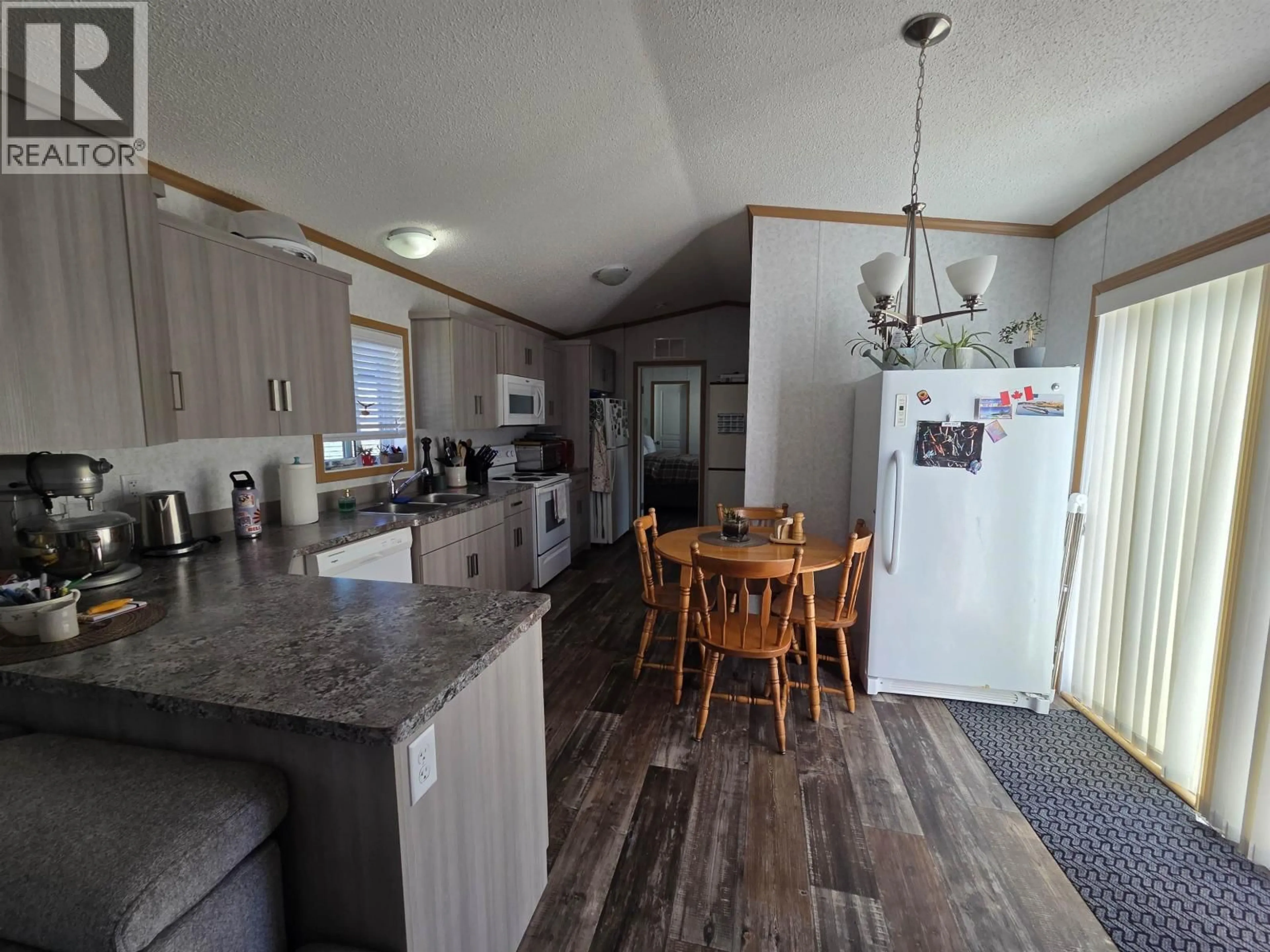 Open concept kitchen, unknown for 121 - 5204 ACKROYD STREET, Terrace British Columbia V8G1E6