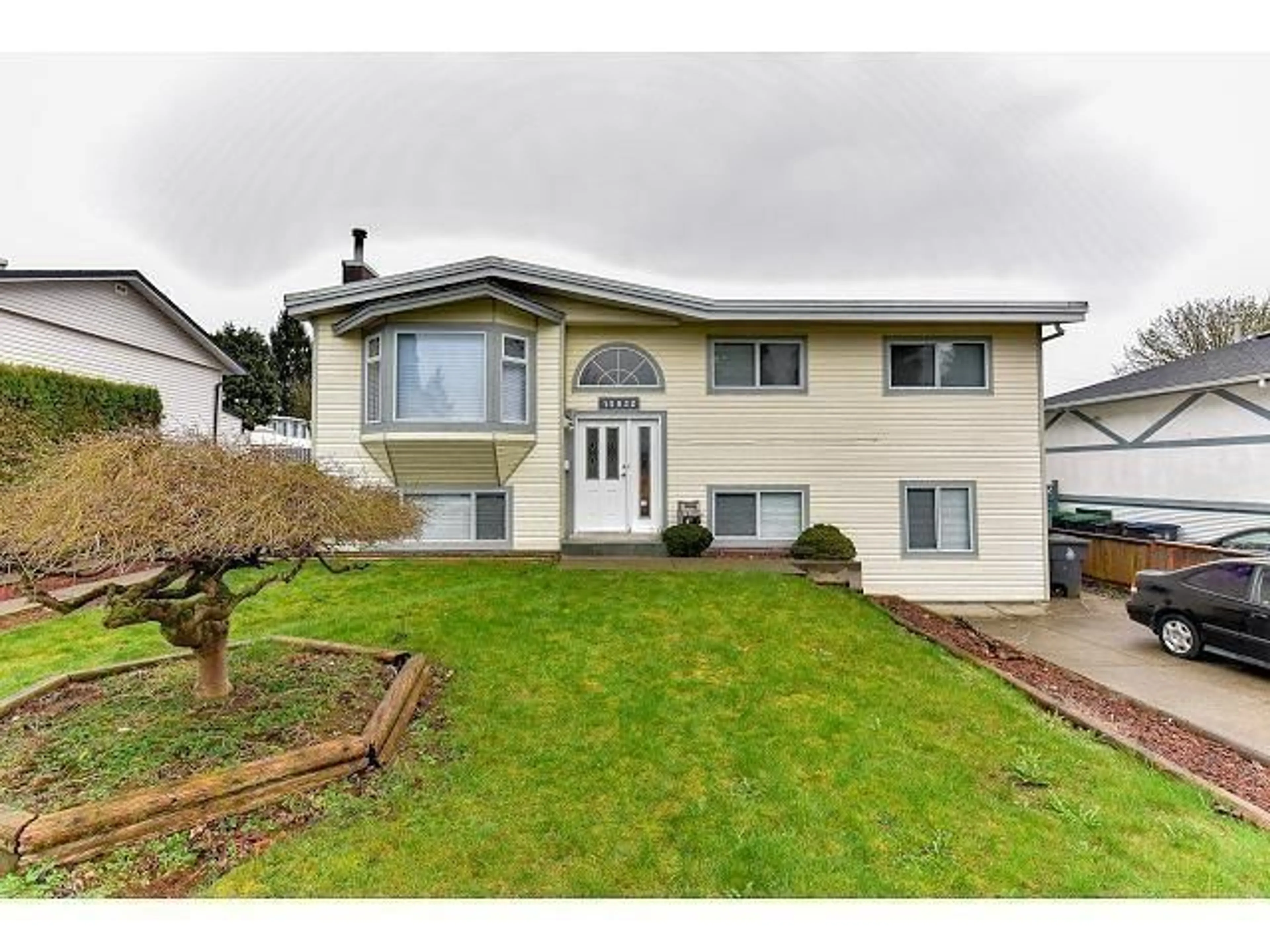 Home with vinyl exterior material, street for 15032 SWALLOW DRIVE, Surrey British Columbia V3R4X2