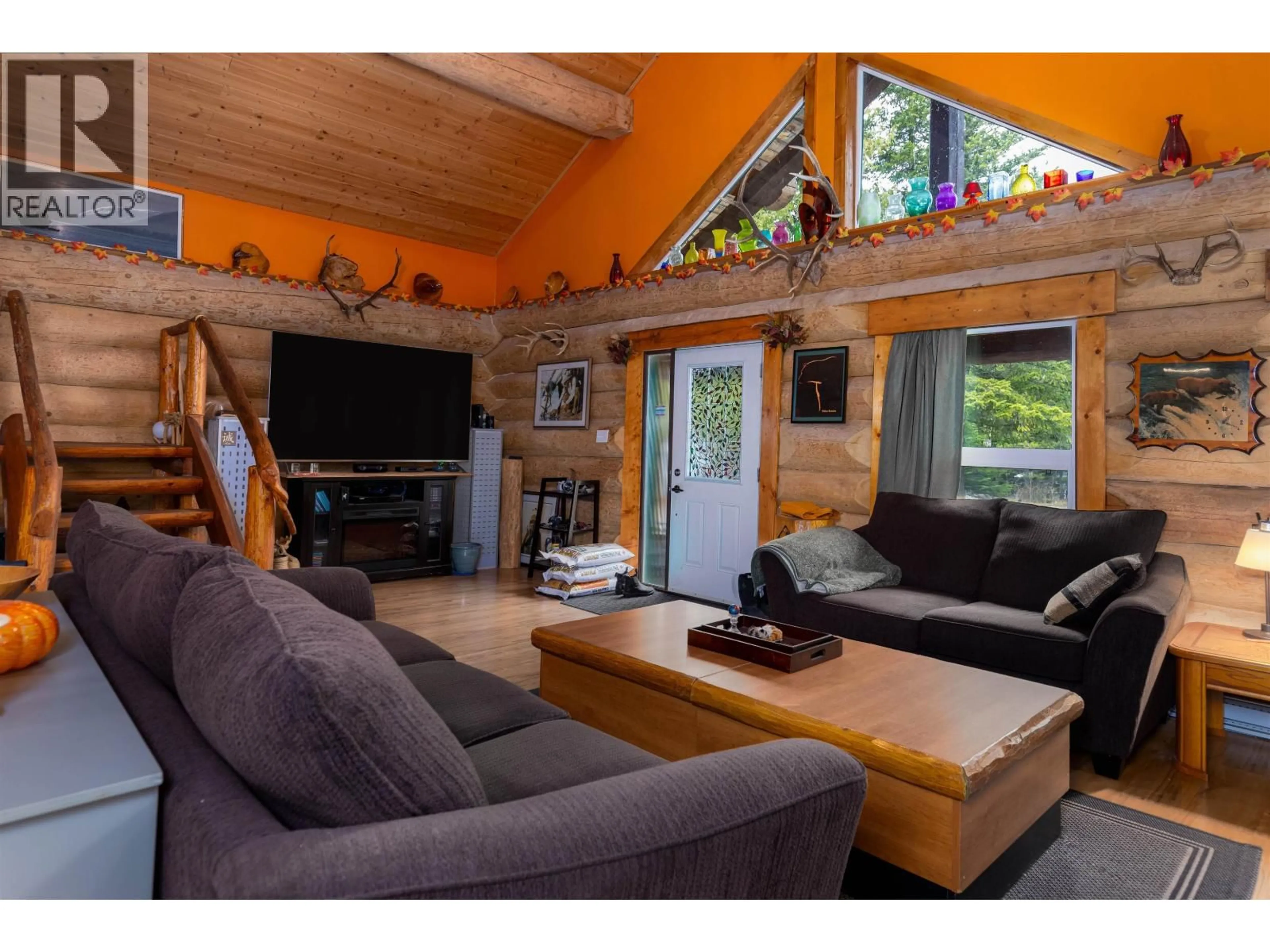 Living room with furniture, wood/laminate floor for 3981 DOBBIE STREET, Terrace British Columbia V8G3M6