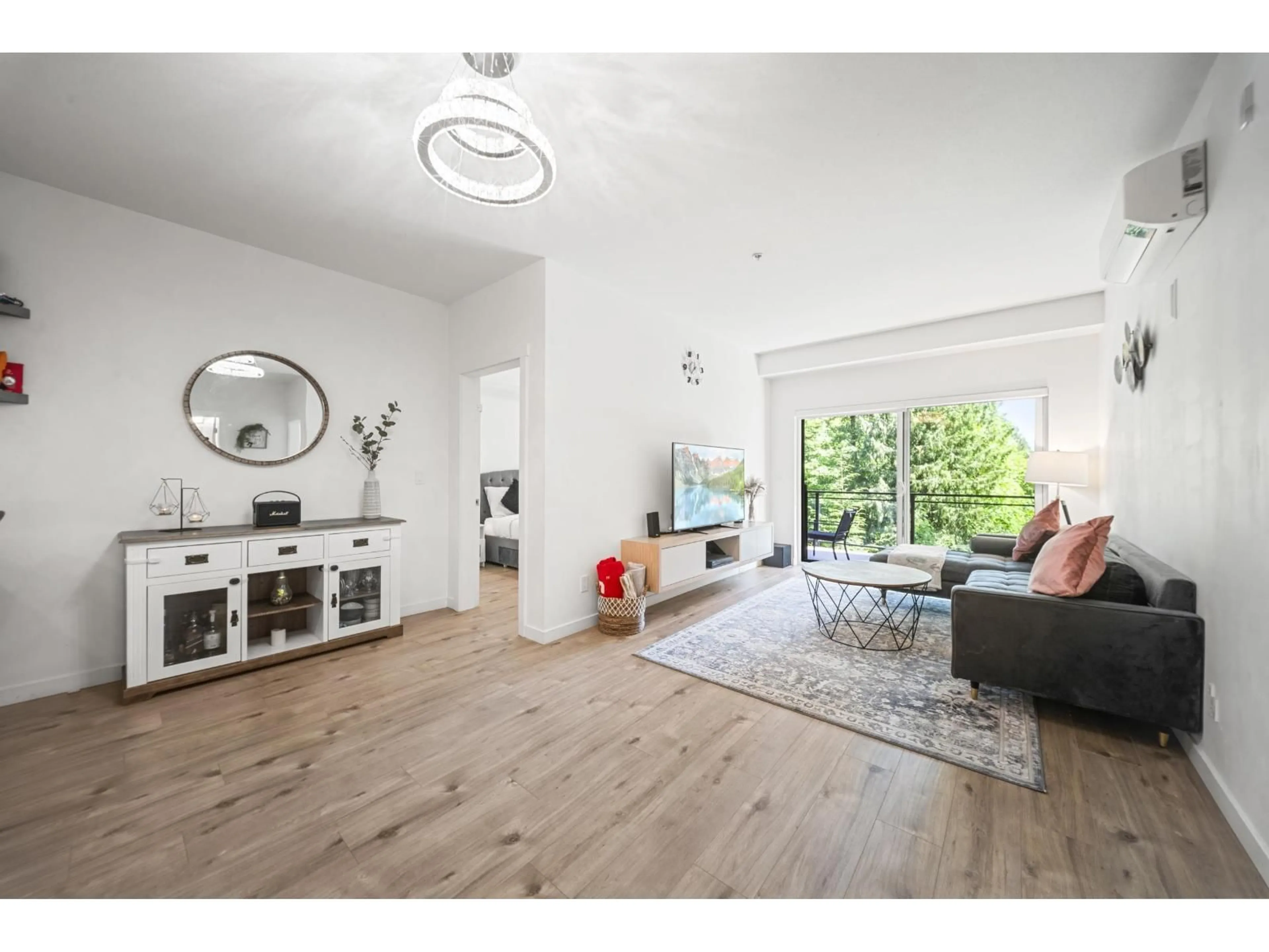 Living room with furniture, unknown for 204 - 3182 GLADWIN ROAD, Abbotsford British Columbia V2T0K8