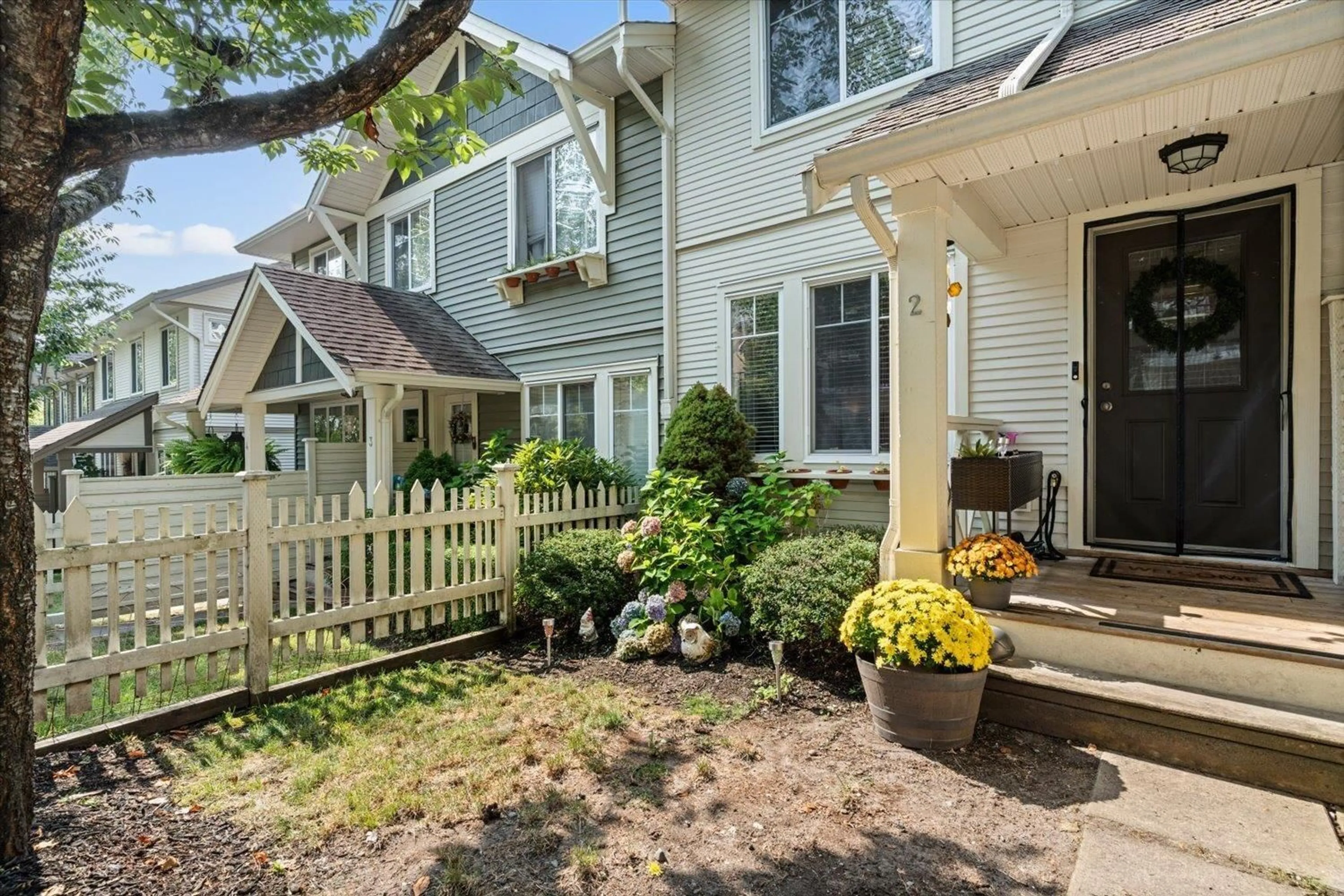 Home with vinyl exterior material, street for 2 - 4401 BLAUSON BOULEVARD, Abbotsford British Columbia V3G0A4