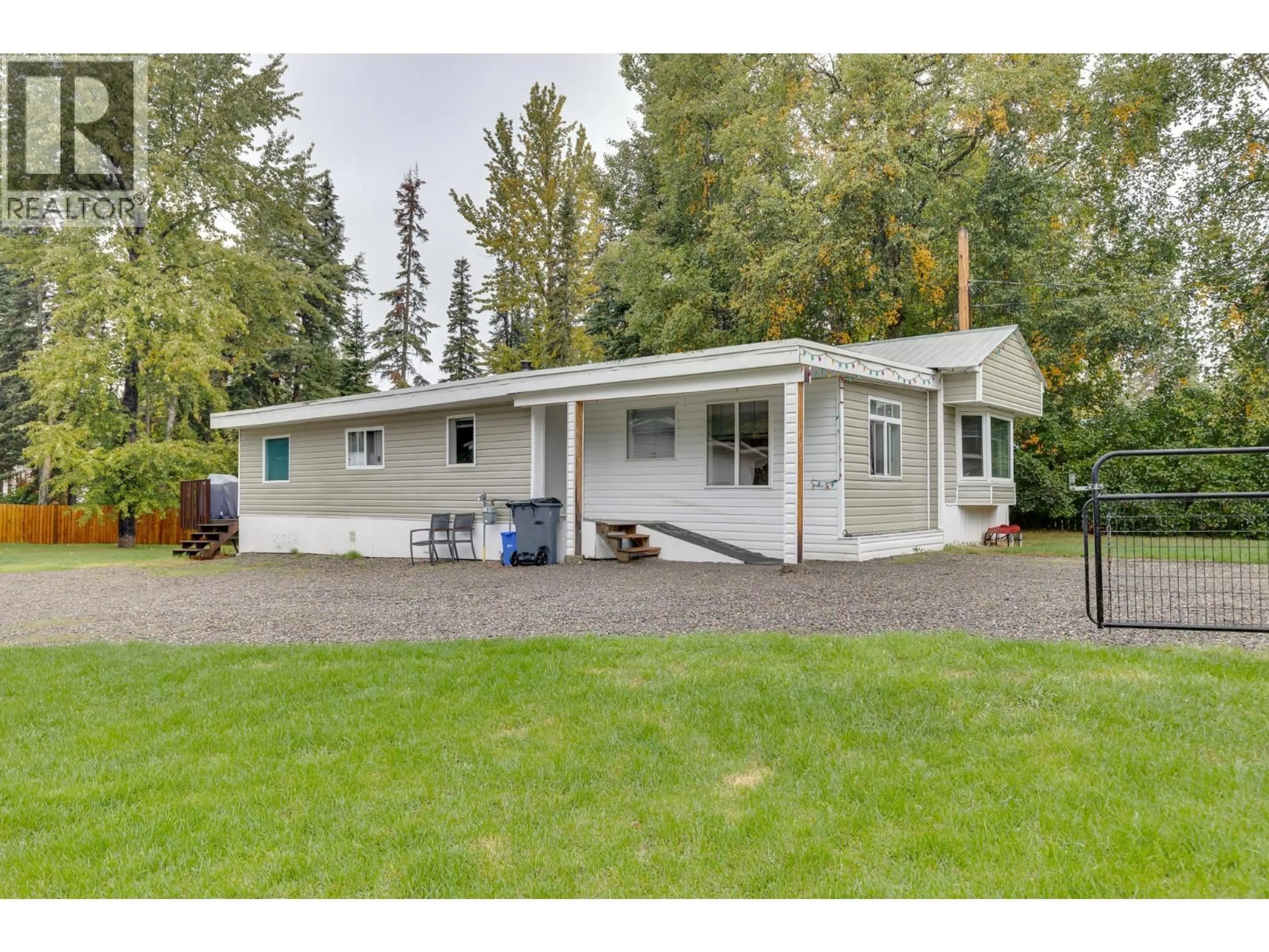Home with vinyl exterior material, street for 6955 ADAM DRIVE, Prince George British Columbia V2K2M9