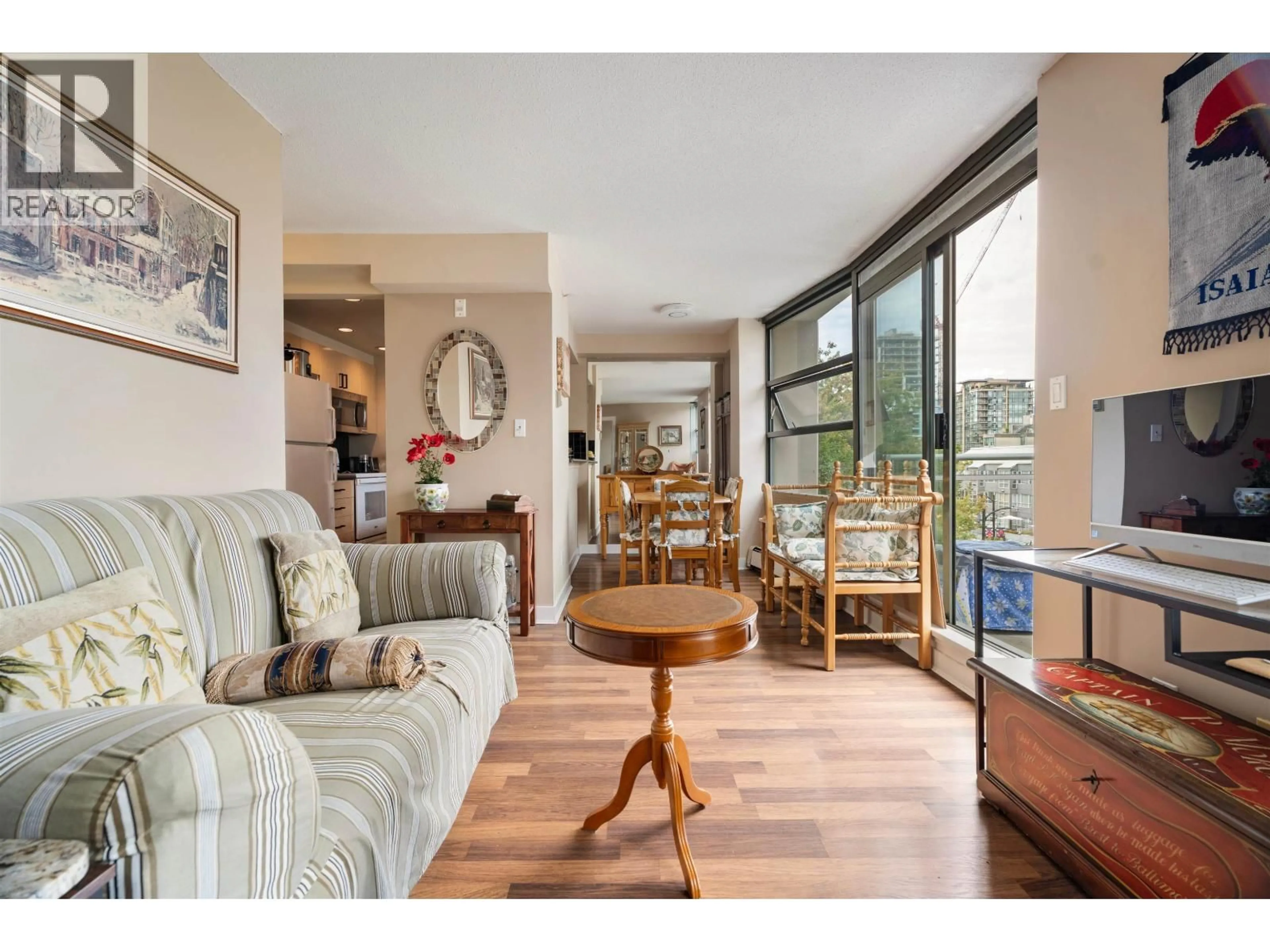 Living room with furniture, wood/laminate floor for 306 - 1688 ROBSON STREET, Vancouver British Columbia V6G1C7