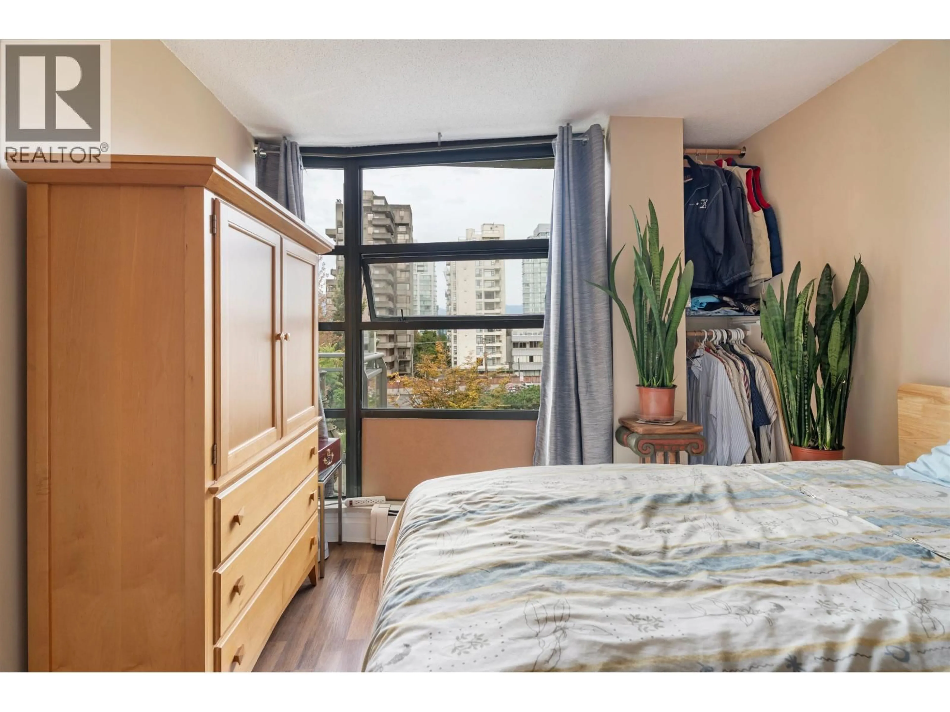 Bedroom with bed, wood/laminate floor for 306 - 1688 ROBSON STREET, Vancouver British Columbia V6G1C7