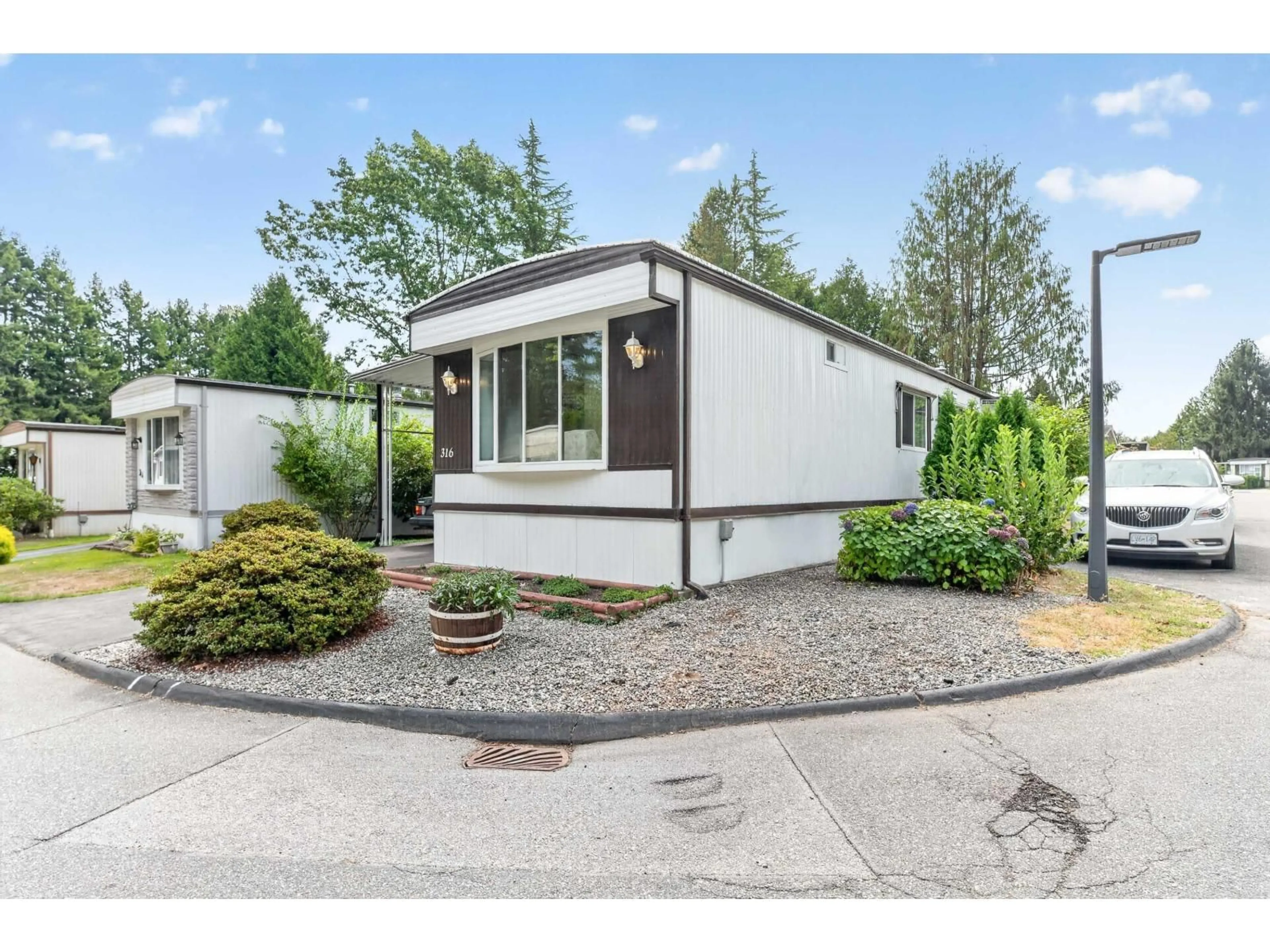 Home with vinyl exterior material, street for 316 - 1840 160 STREET, Surrey British Columbia V4A4X4