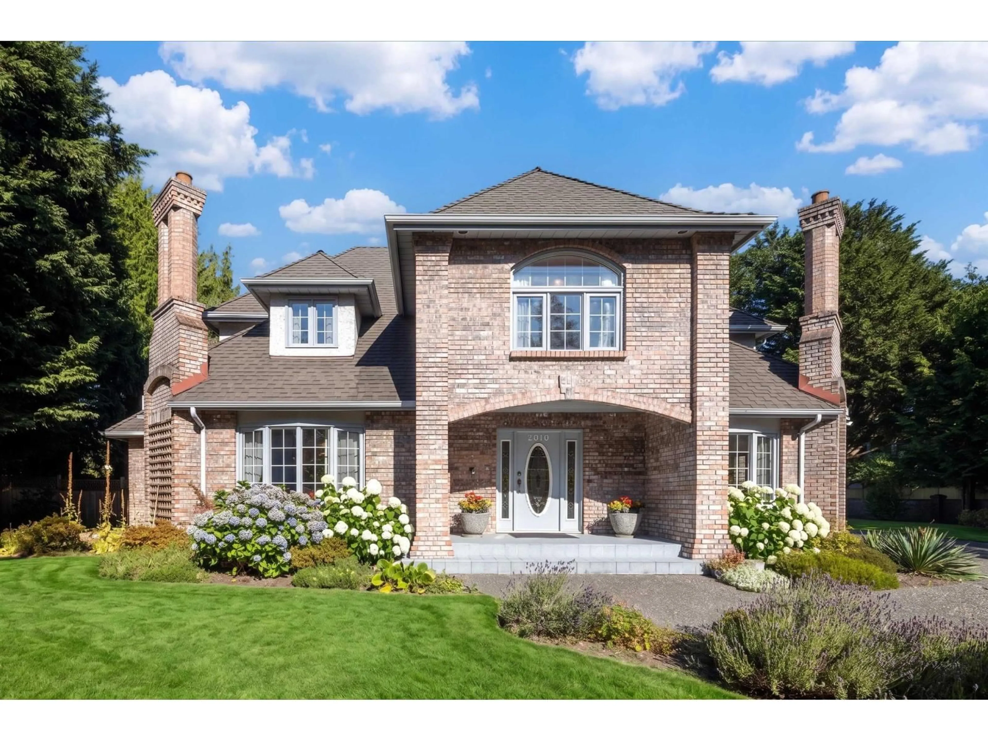 Home with brick exterior material, street for 2010 132A STREET, Surrey British Columbia V4A9K2