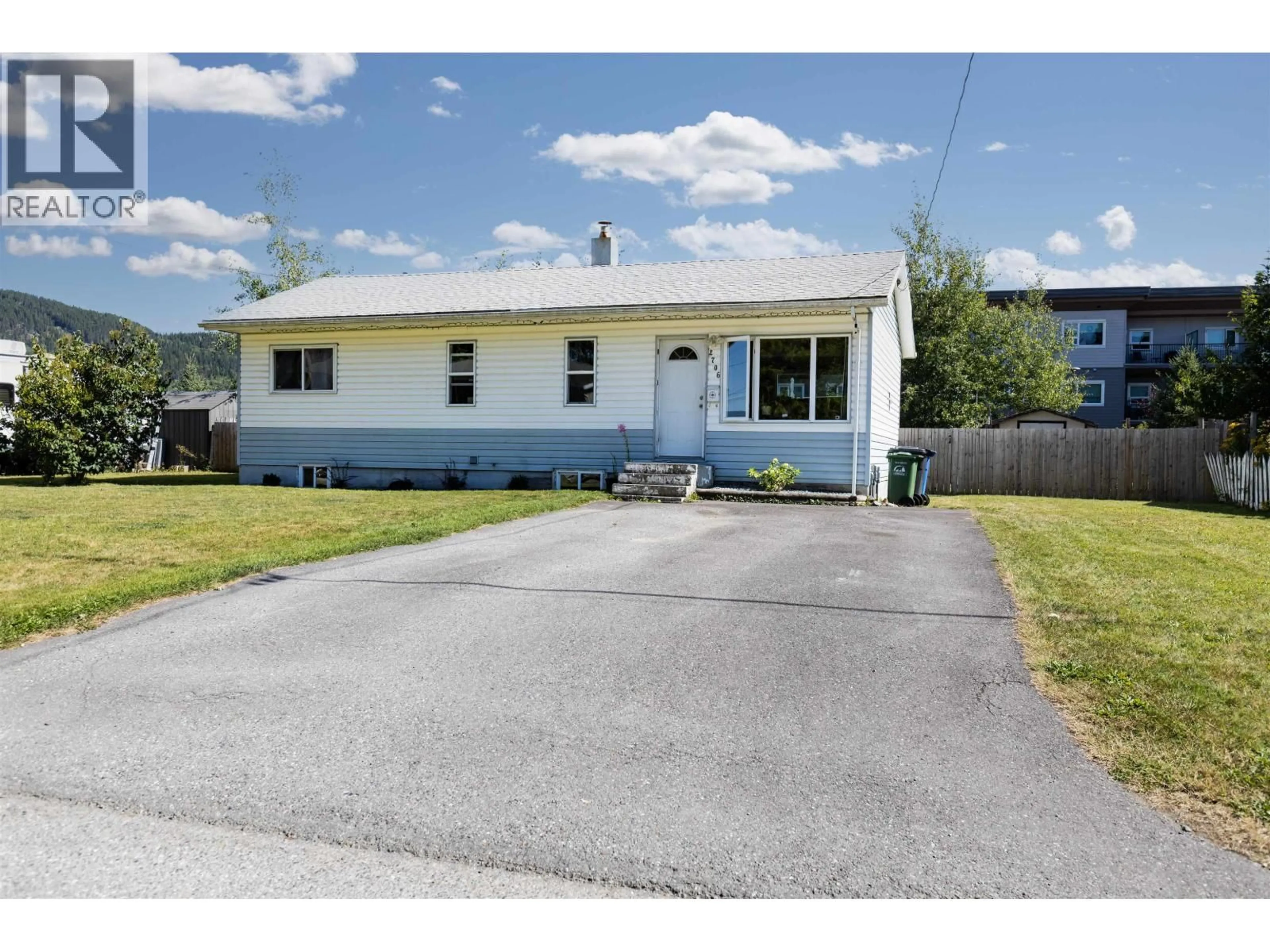 Home with vinyl exterior material, street for 2706 HALL STREET, Terrace British Columbia V8G2R7