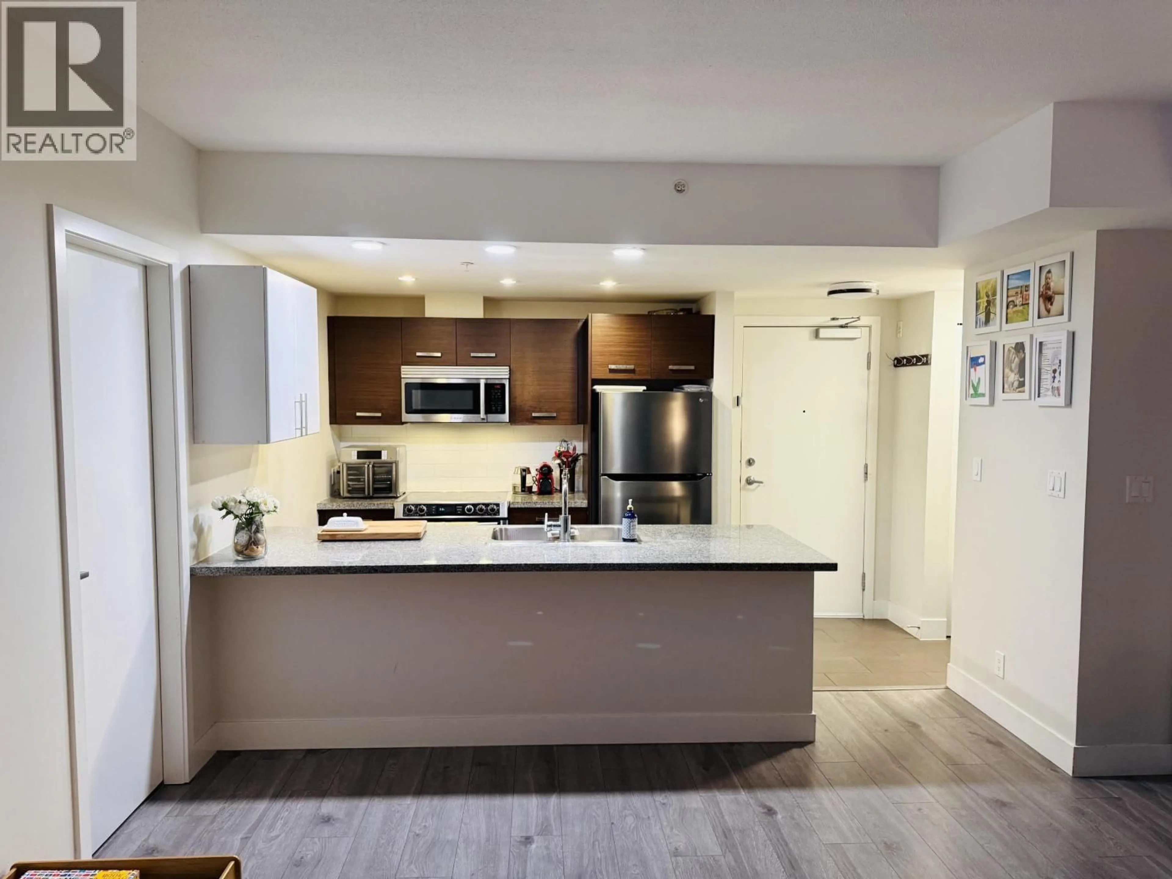Open concept kitchen, unknown for 207 - 2957 GLEN DRIVE, Coquitlam British Columbia V3B0B5