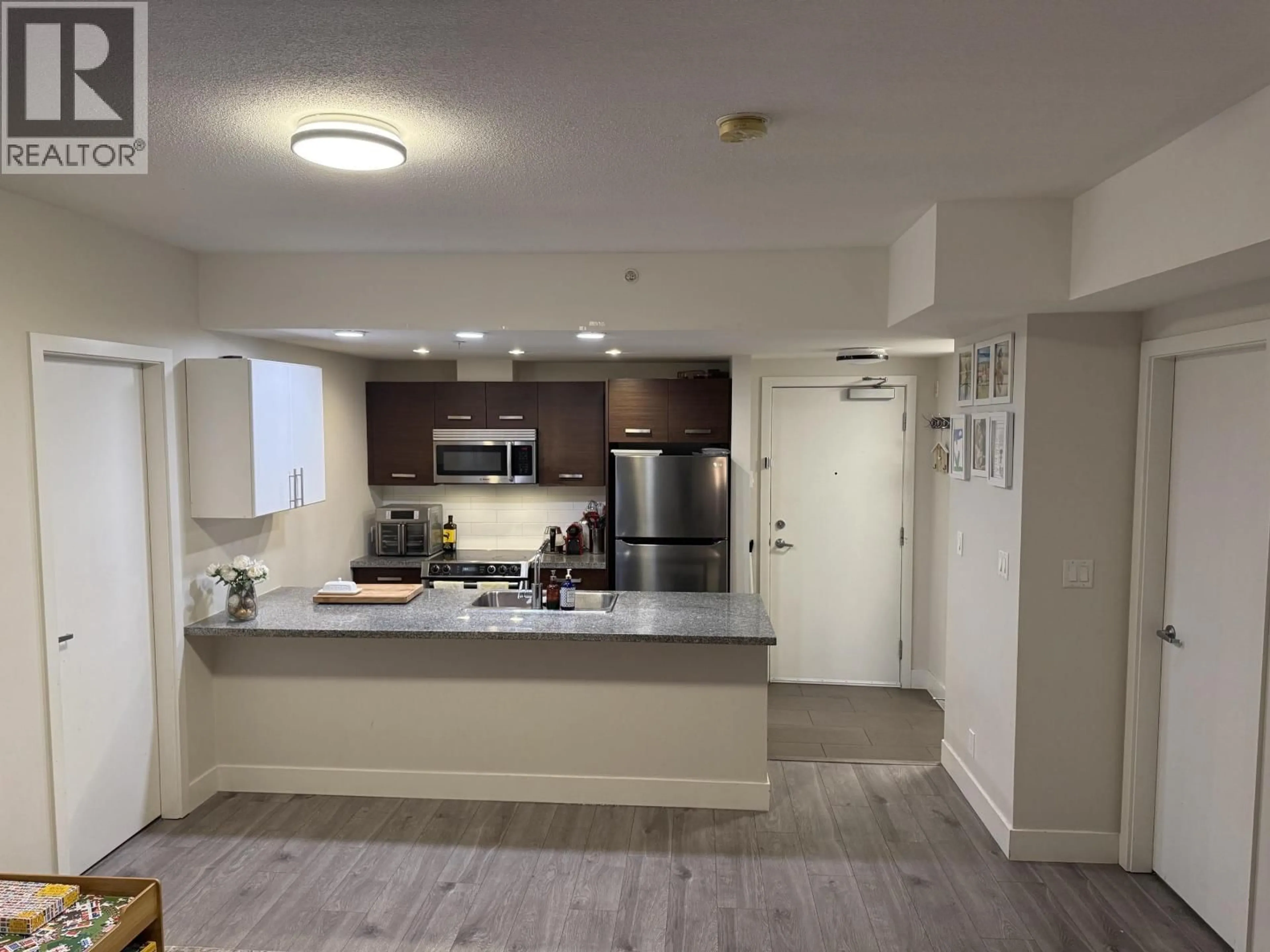 Open concept kitchen, unknown for 207 - 2957 GLEN DRIVE, Coquitlam British Columbia V3B0B5