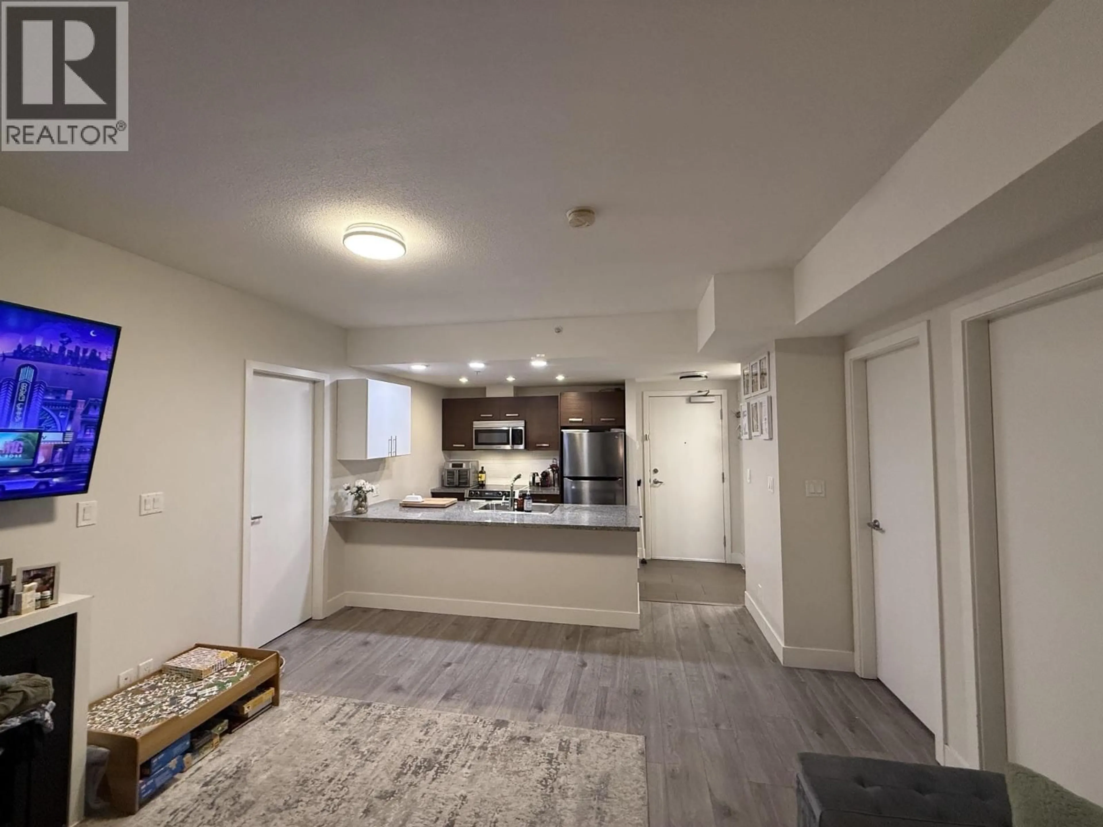 A pic of a room for 207 - 2957 GLEN DRIVE, Coquitlam British Columbia V3B0B5