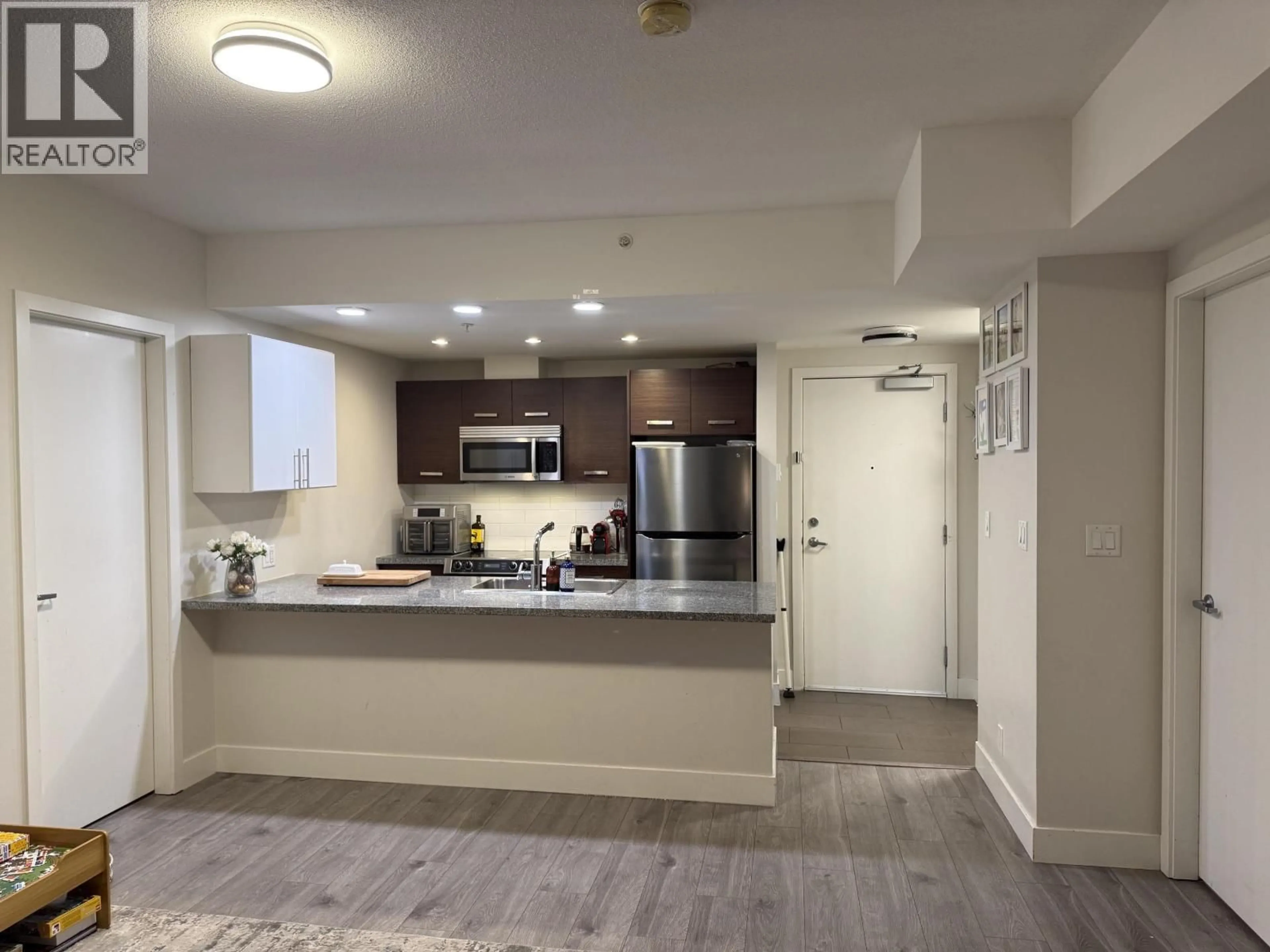 Open concept kitchen, unknown for 207 - 2957 GLEN DRIVE, Coquitlam British Columbia V3B0B5