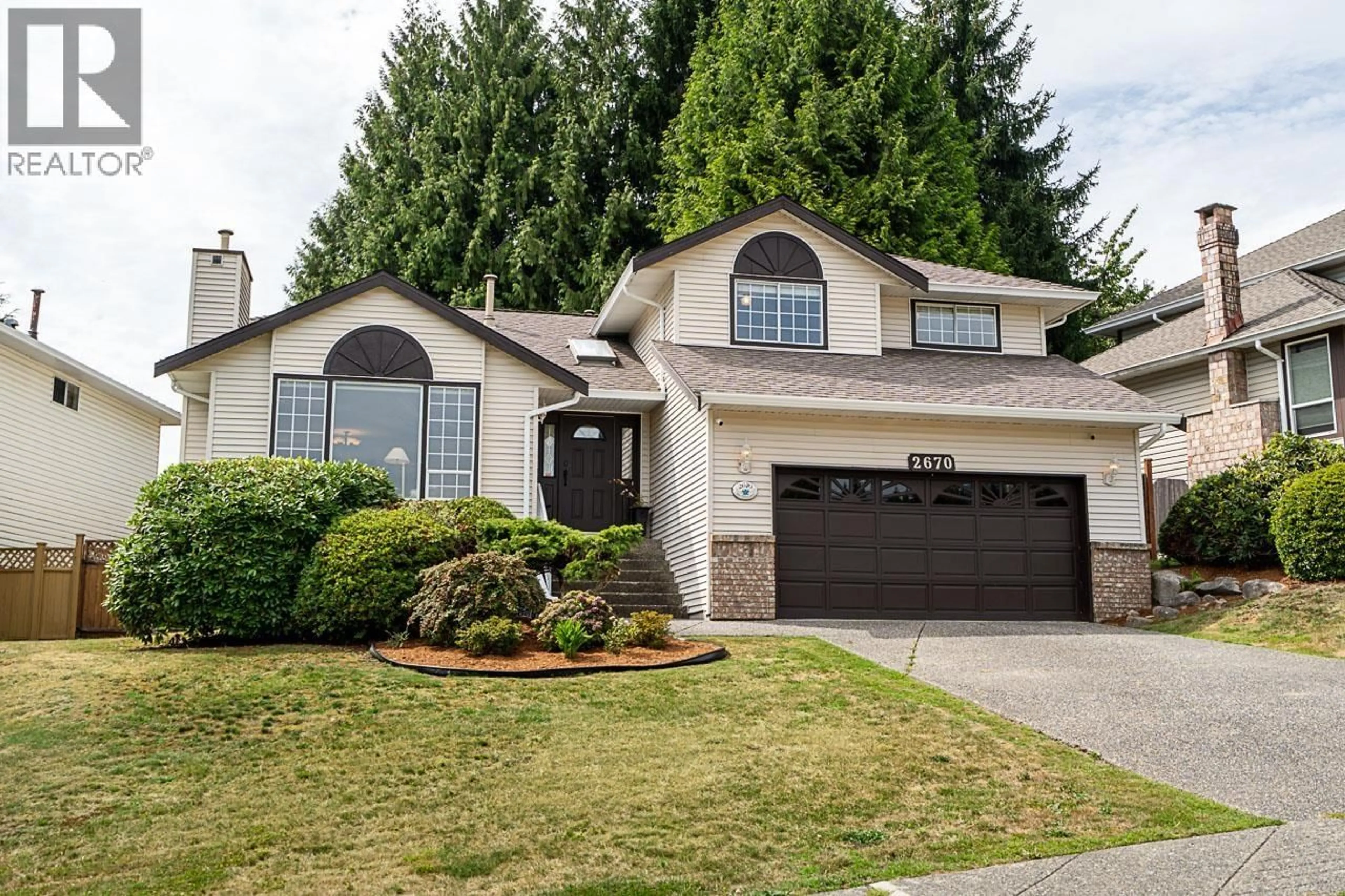 Home with vinyl exterior material, street for 2670 BREWSTER DRIVE, Coquitlam British Columbia V3B7A4