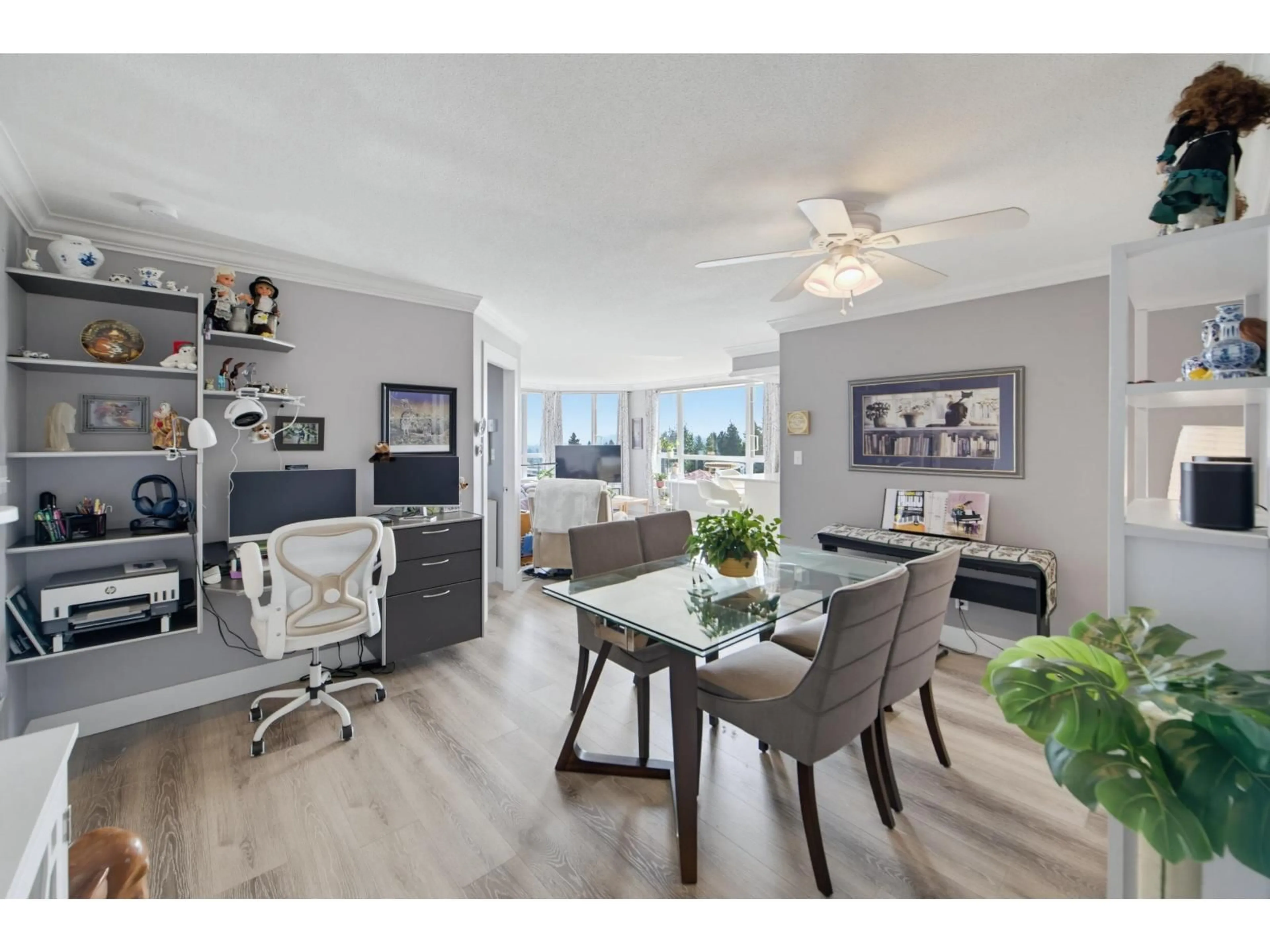 Living room with furniture, wood/laminate floor for 701 - 3190 GLADWIN ROAD, Abbotsford British Columbia V2T5T2