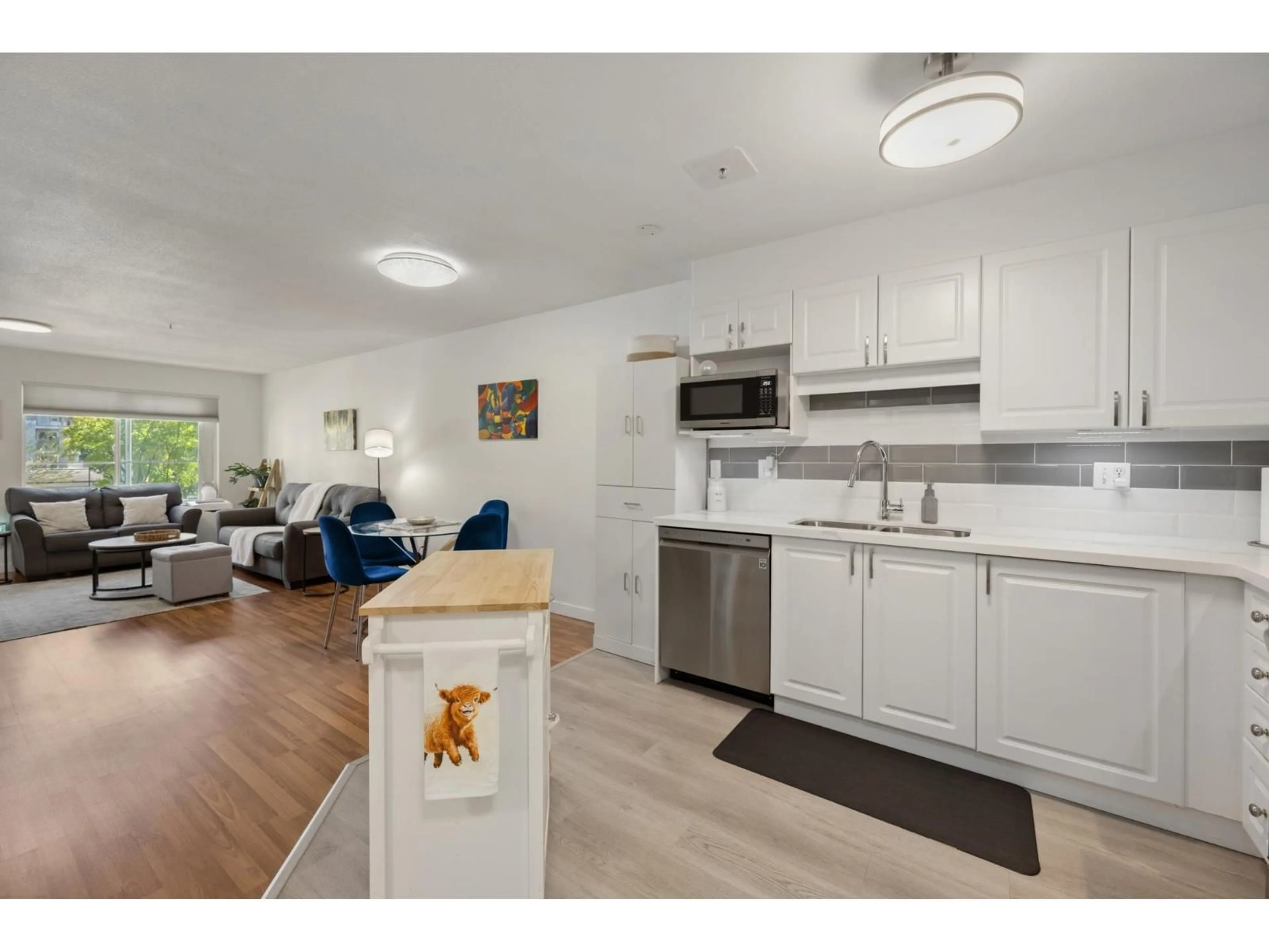 Open concept kitchen, unknown for 202 - 5765 GLOVER ROAD, Langley British Columbia V3A8M8