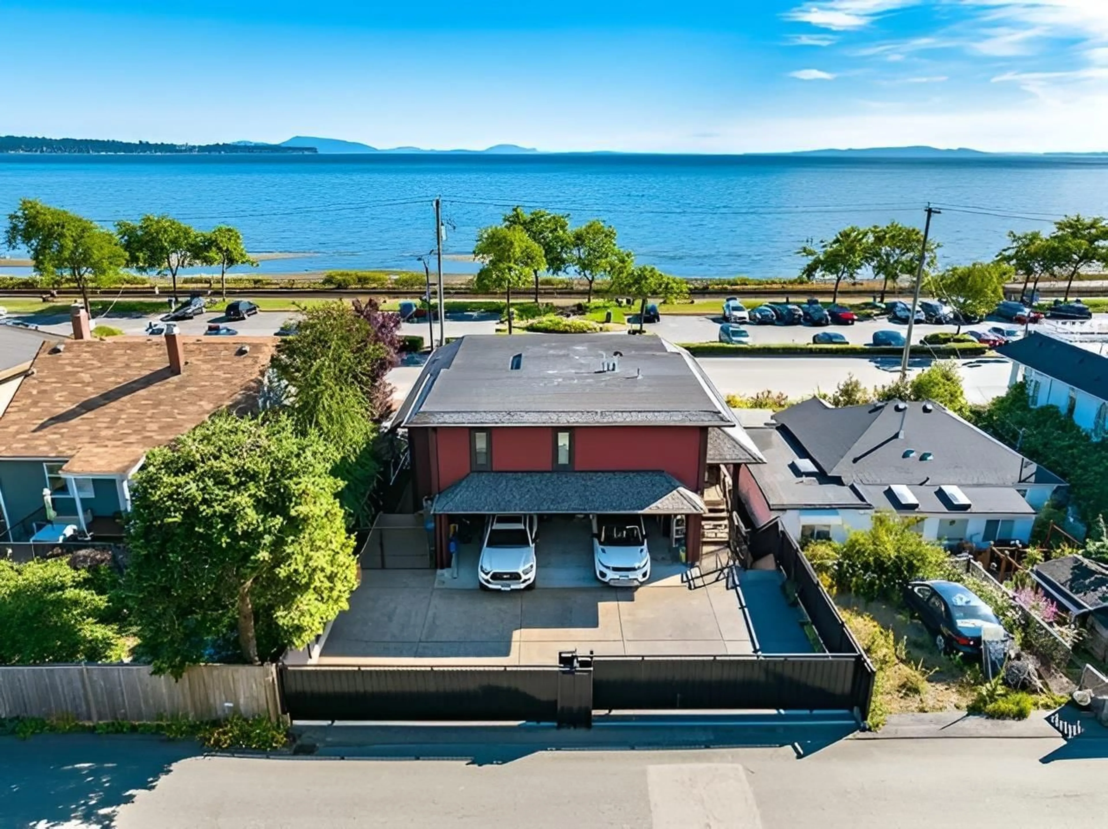 A pic from outside/outdoor area/front of a property/back of a property/a pic from drone, water/lake/river/ocean view for 14647 MARINE DRIVE, White Rock British Columbia V4B1B8