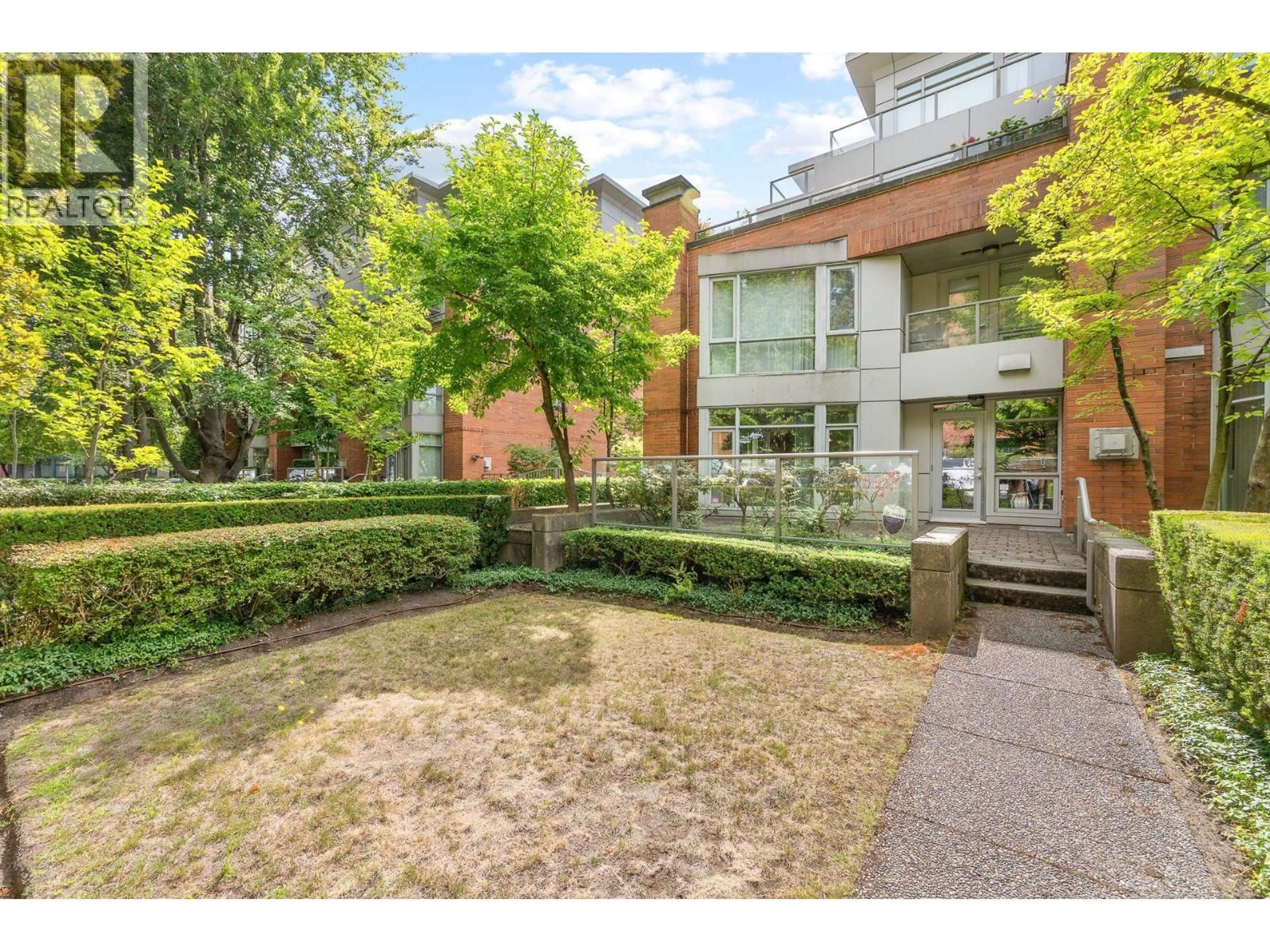 A pic from outside/outdoor area/front of a property/back of a property/a pic from drone, street for 201 - 638 45TH AVENUE, Vancouver British Columbia V5Z4R8