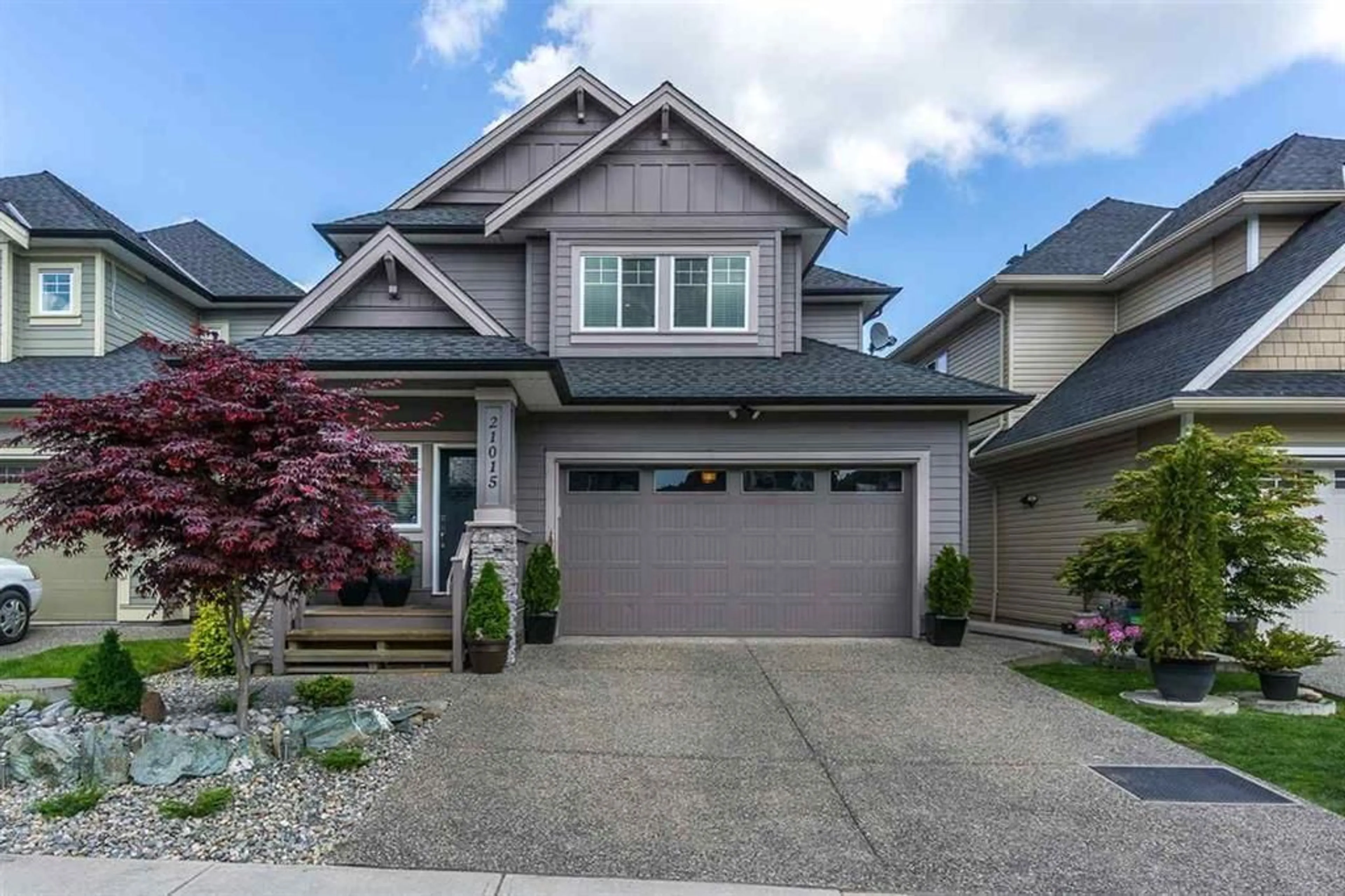 Home with vinyl exterior material, street for 21015 80A AVENUE, Langley British Columbia V2J0J4