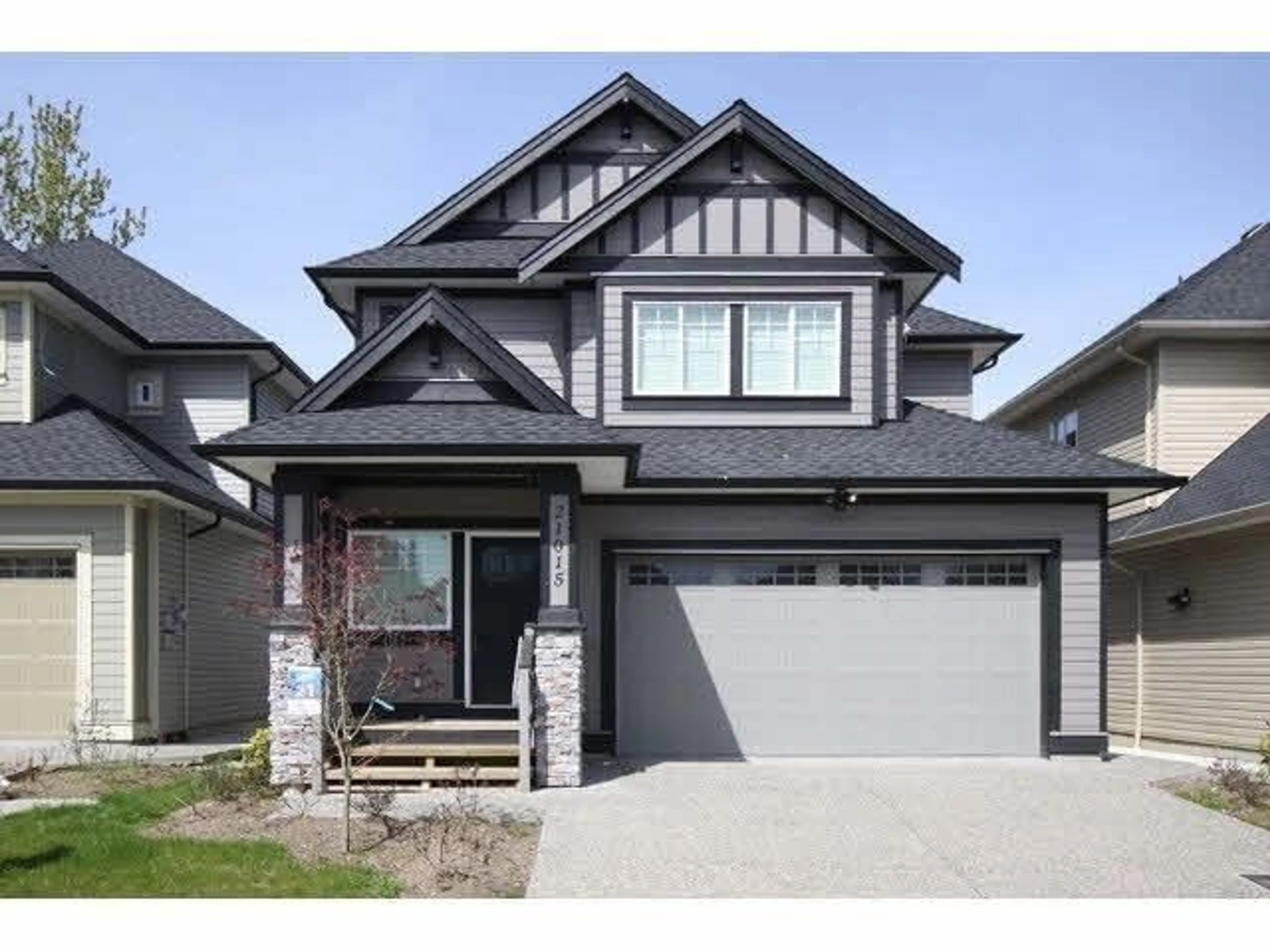 Home with vinyl exterior material, street for 21015 80A AVENUE, Langley British Columbia V2J0J4
