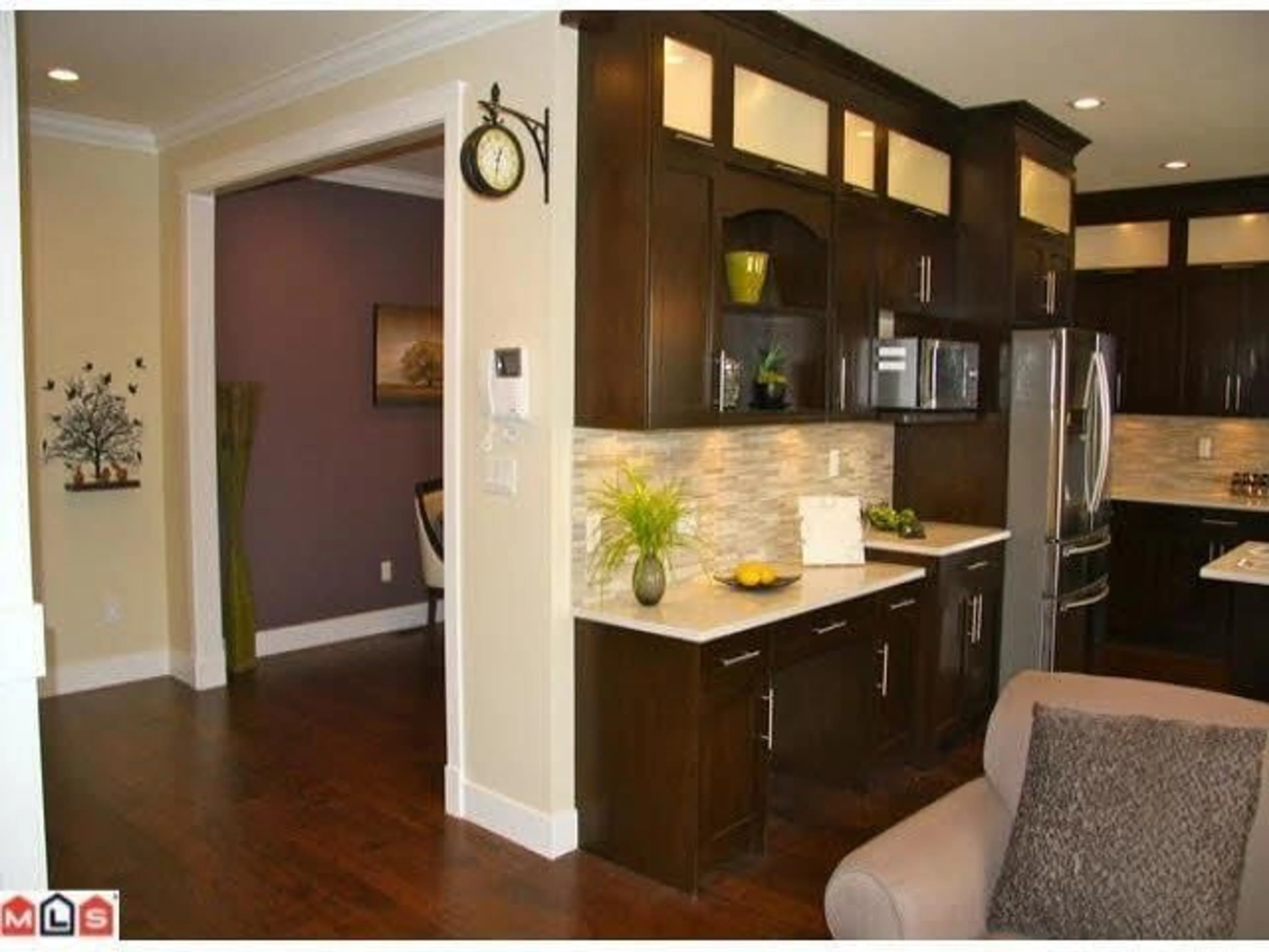 Open concept kitchen, wood/laminate floor for 21015 80A AVENUE, Langley British Columbia V2J0J4