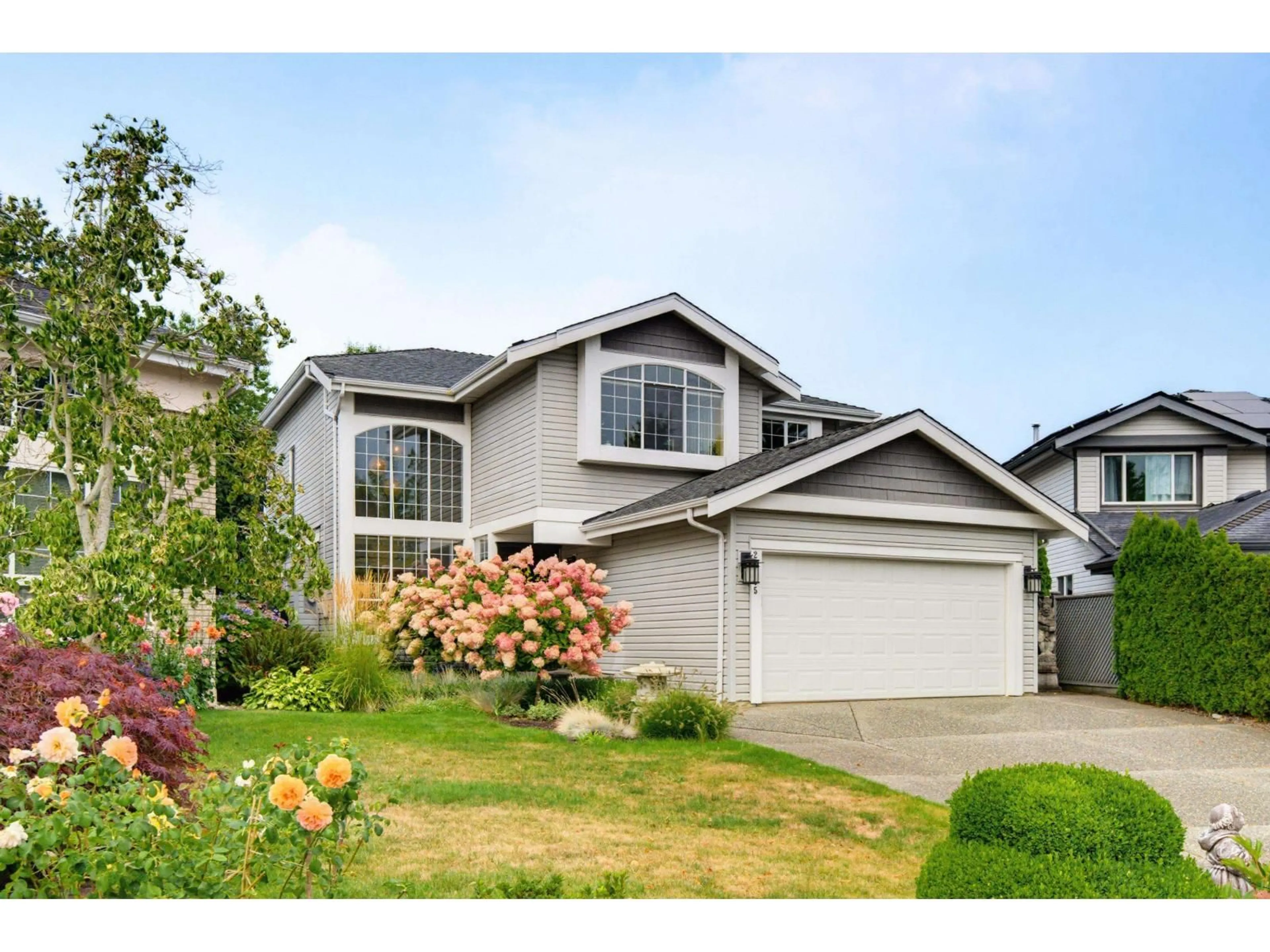 Home with vinyl exterior material, street for 22105 45A AVENUE, Langley British Columbia V2Z1B5