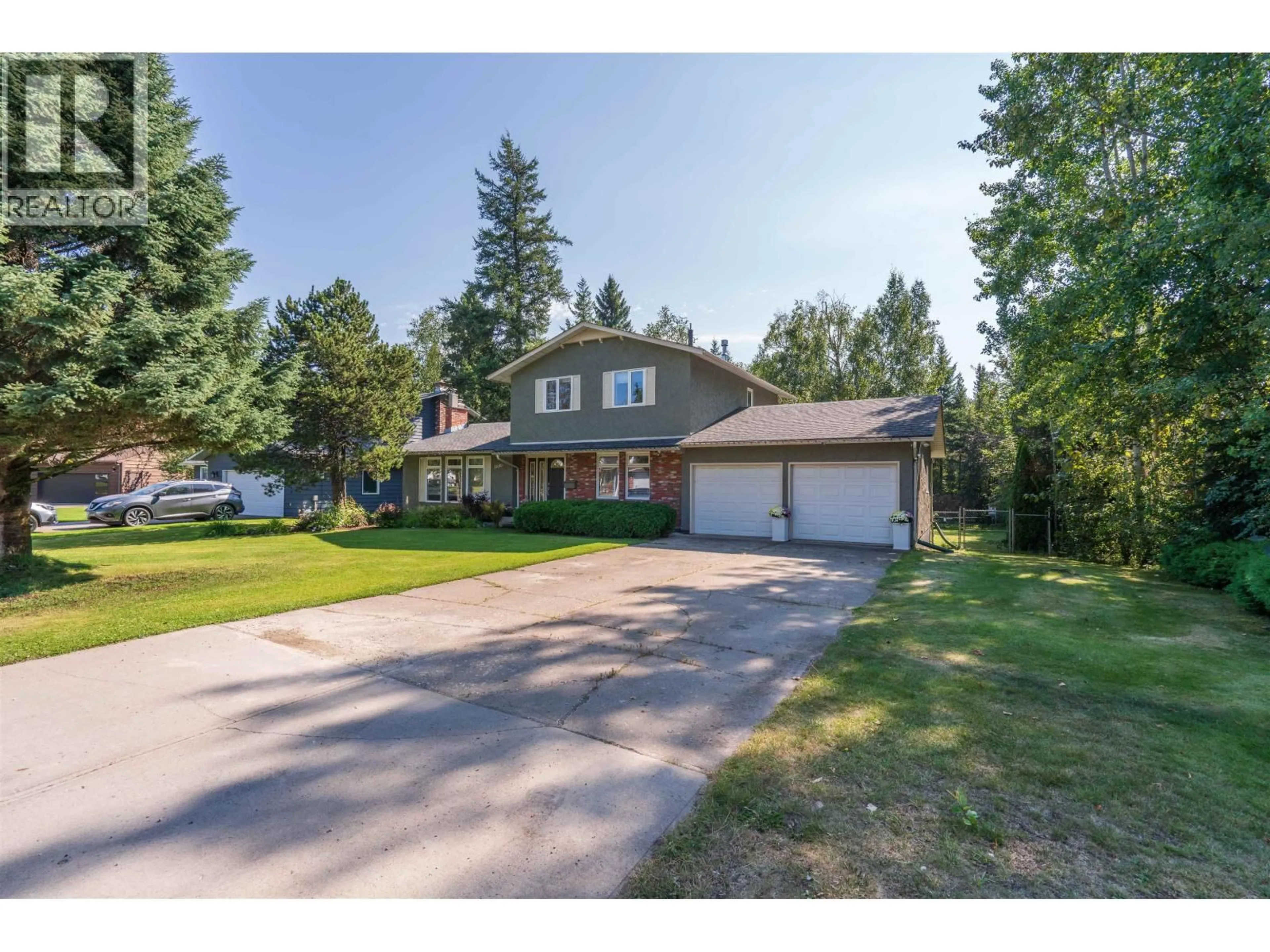 A pic from outside/outdoor area/front of a property/back of a property/a pic from drone, street for 5680 MORIARTY CRESCENT, Prince George British Columbia V2N3X3