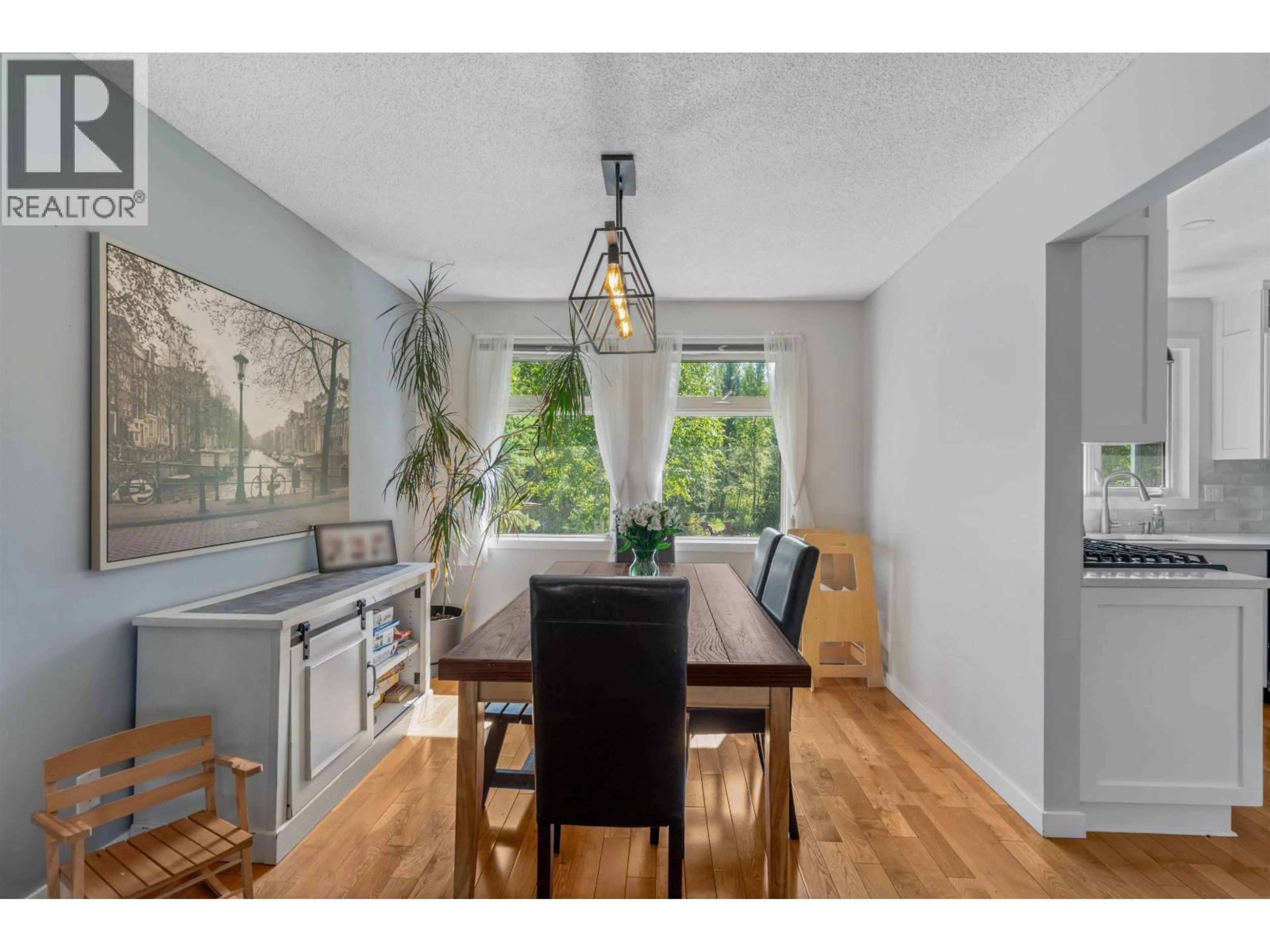 Dining room, wood/laminate floor for 5680 MORIARTY CRESCENT, Prince George British Columbia V2N3X3