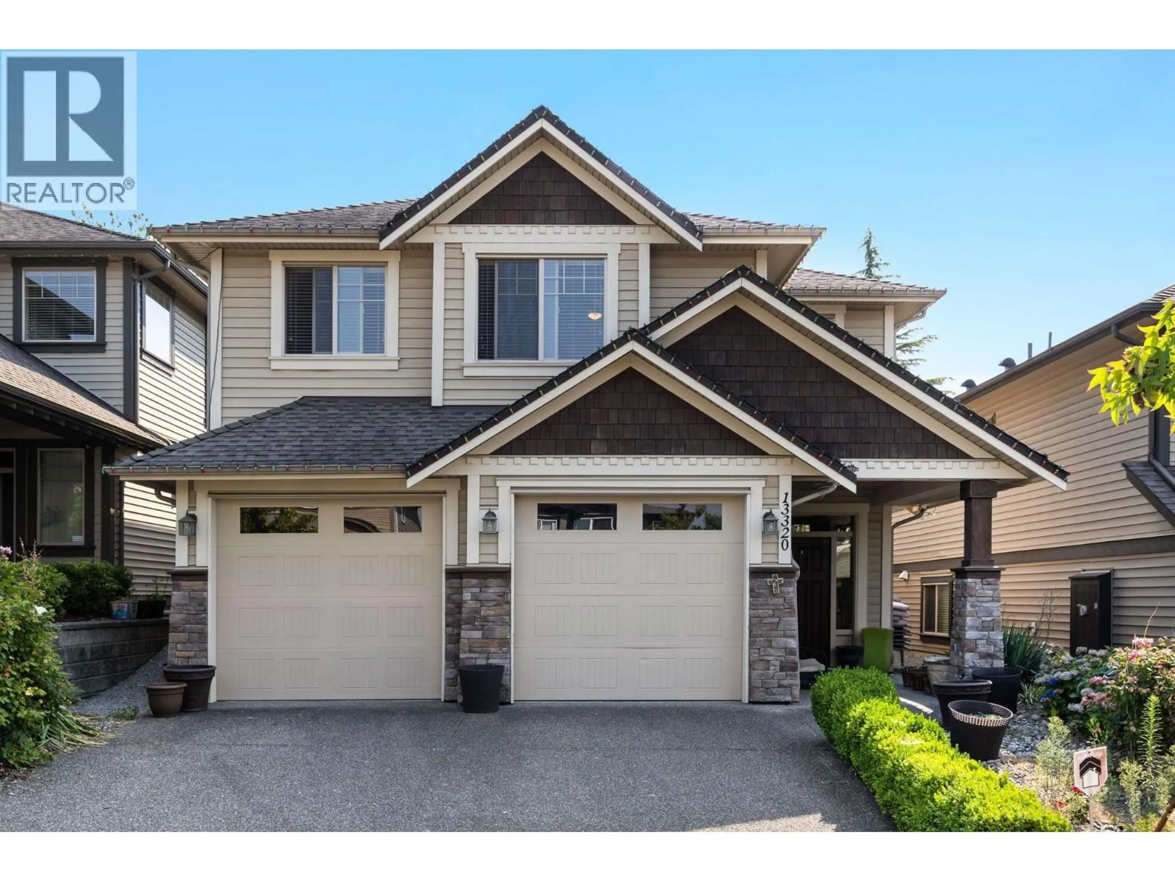 Home with vinyl exterior material, street for 13320 236 STREET, Maple Ridge British Columbia V4R0E4
