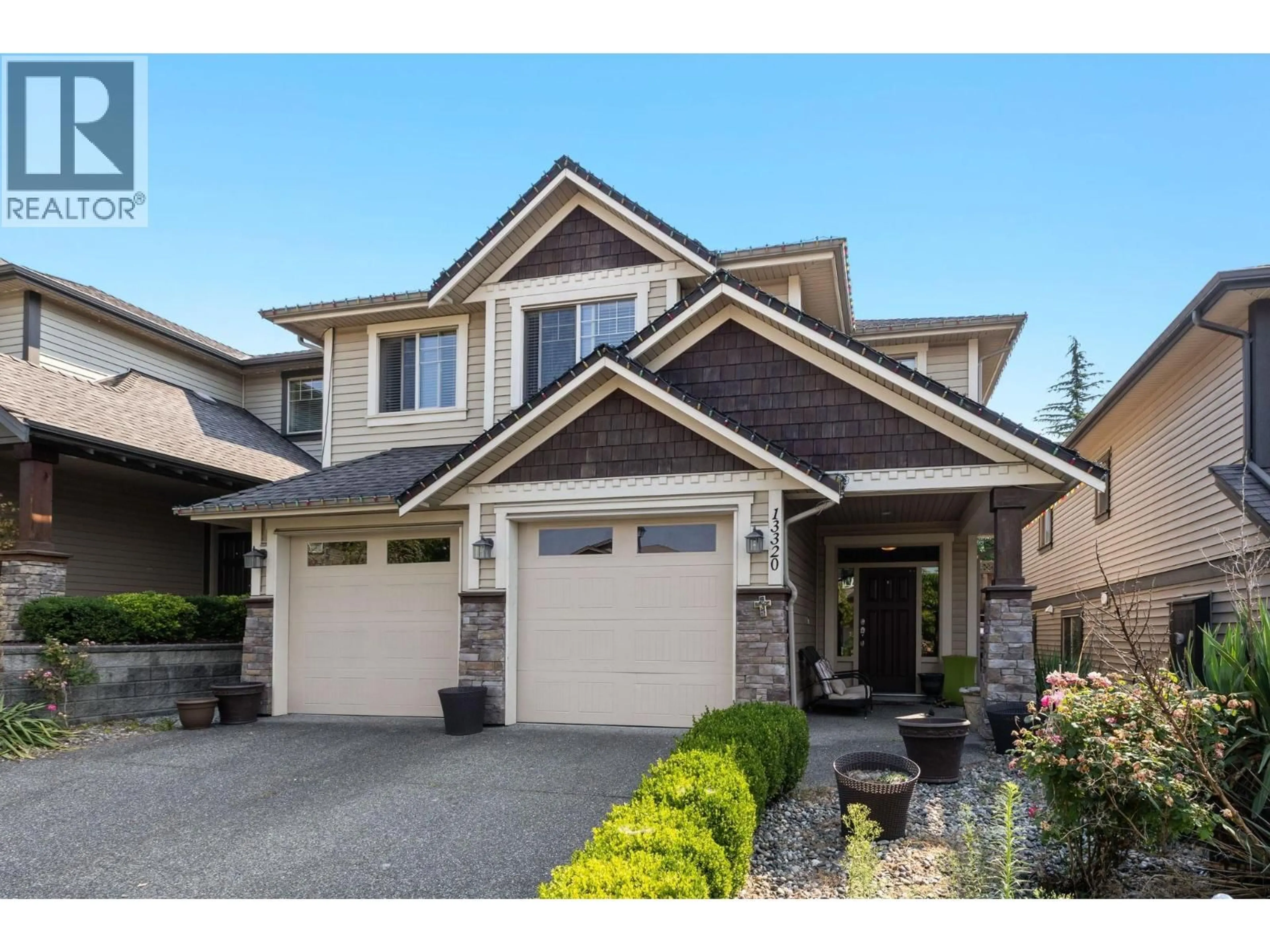 Home with vinyl exterior material, street for 13320 236 STREET, Maple Ridge British Columbia V4R0E4