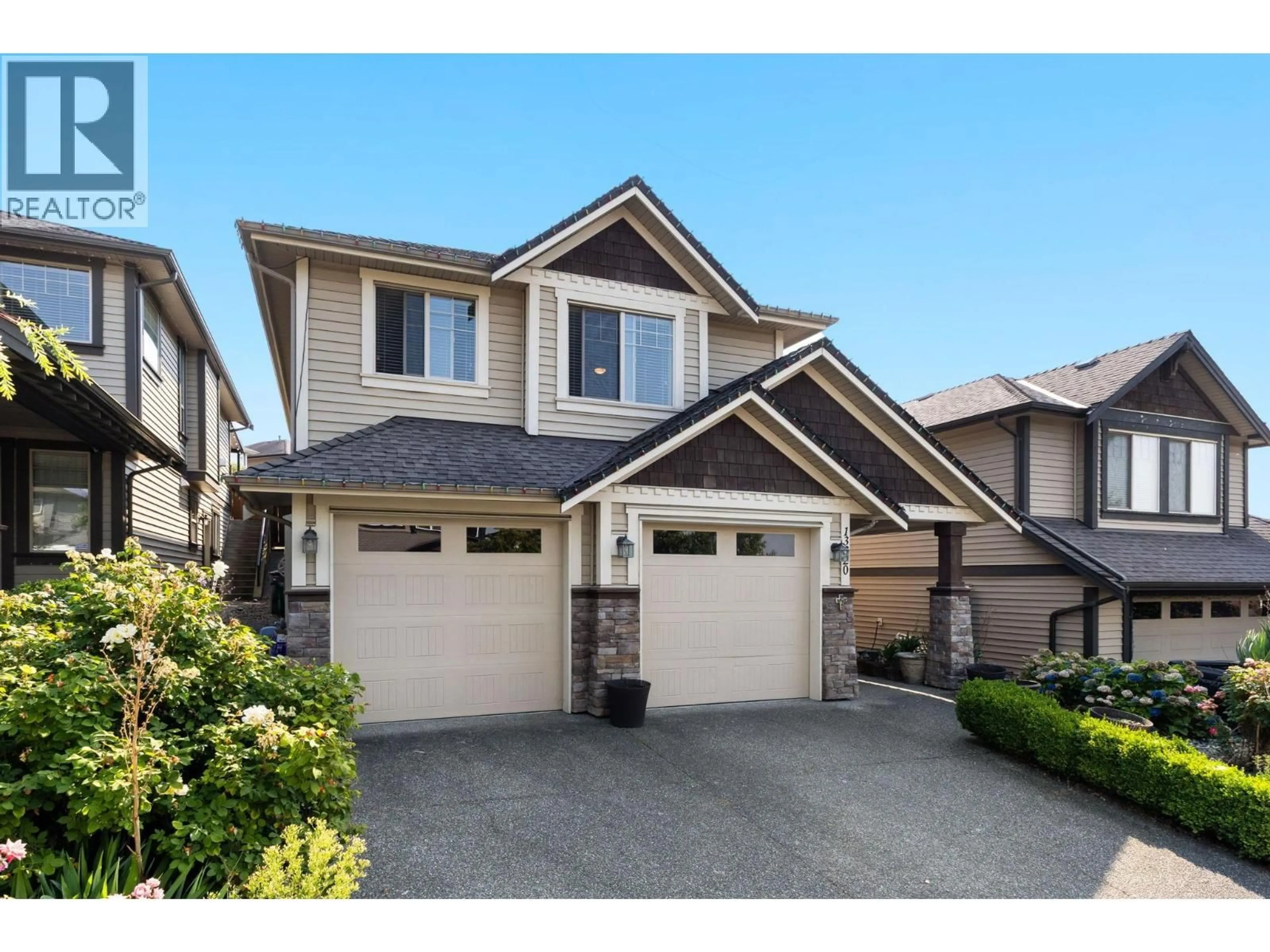 Home with vinyl exterior material, street for 13320 236 STREET, Maple Ridge British Columbia V4R0E4