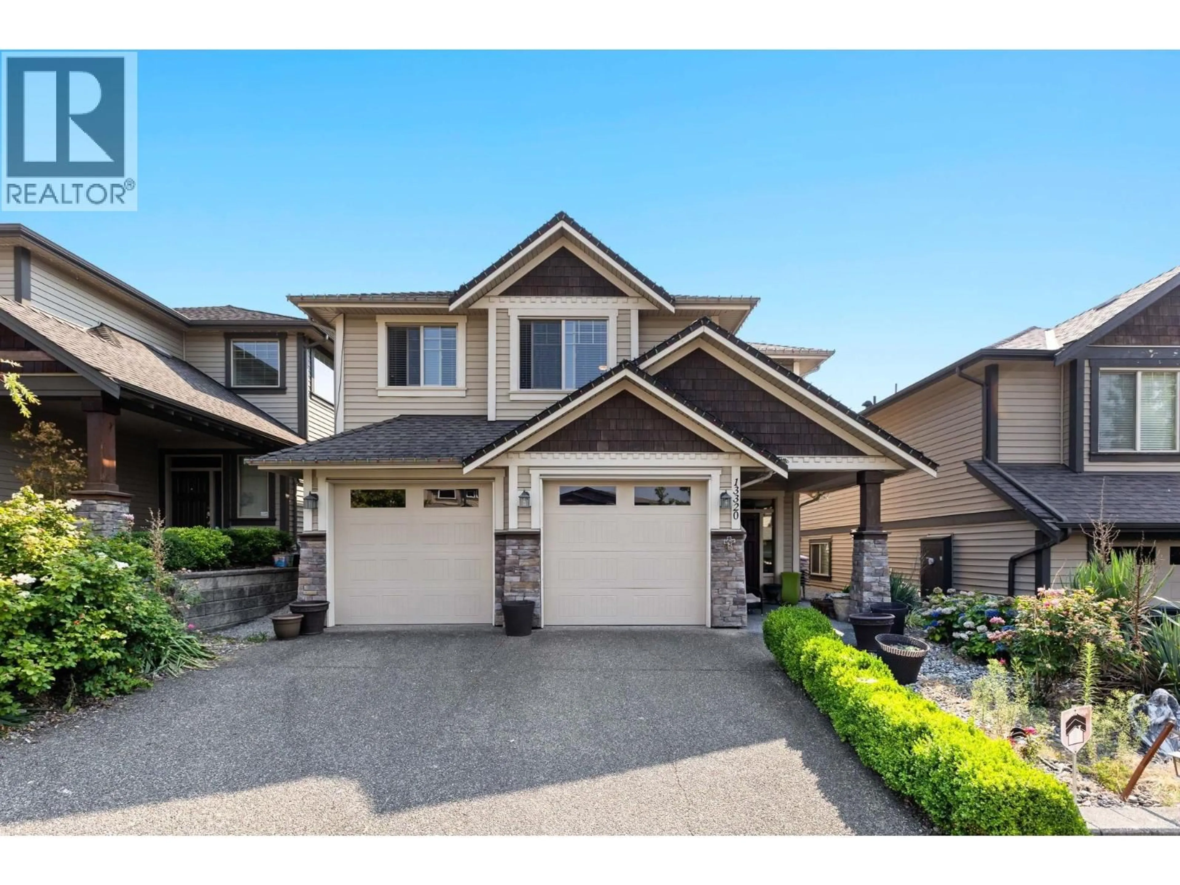 Home with vinyl exterior material, street for 13320 236 STREET, Maple Ridge British Columbia V4R0E4