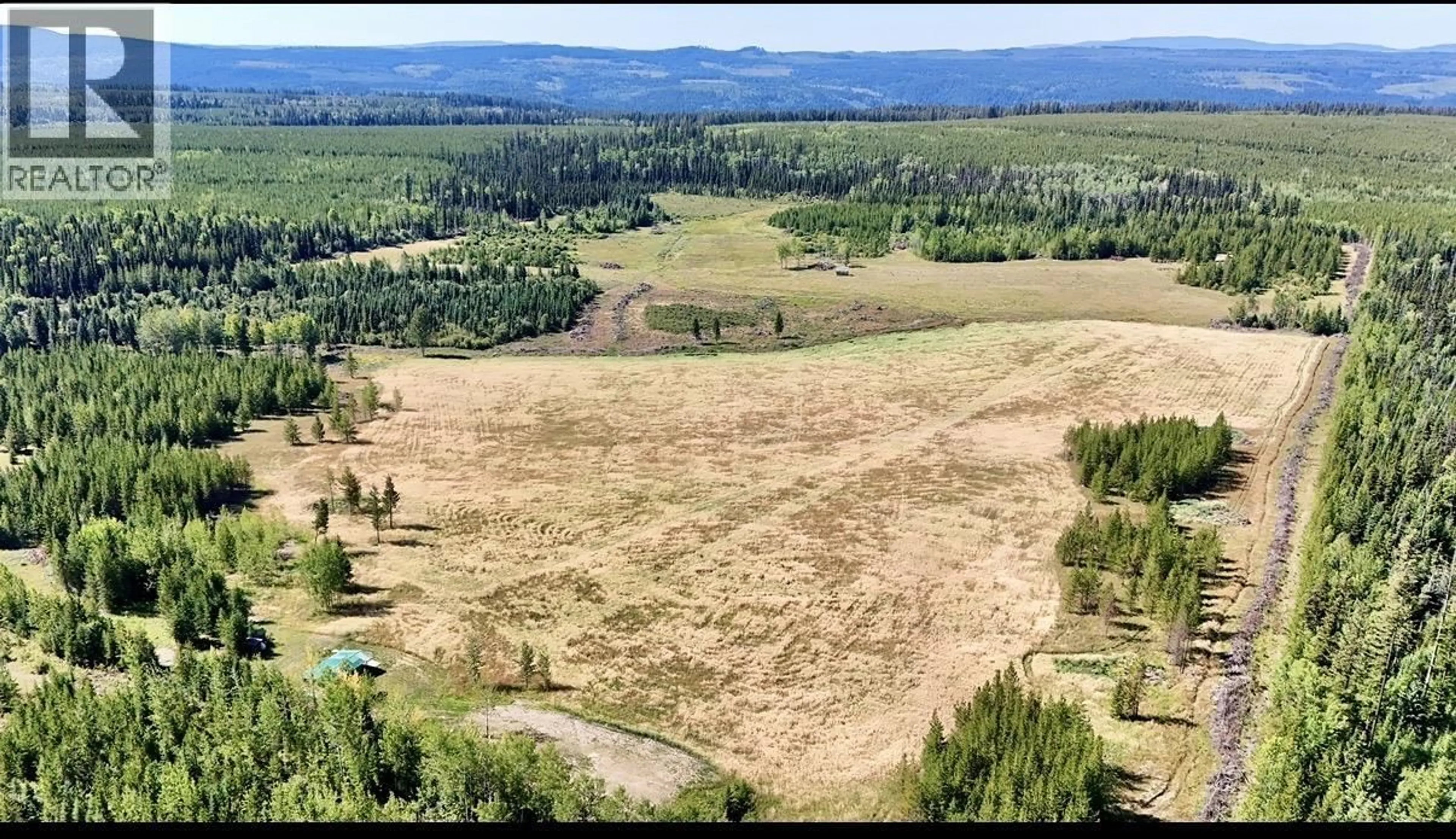 A pic from outside/outdoor area/front of a property/back of a property/a pic from drone, forest/trees view for 2935 MILES CREEK FS ROAD, Likely British Columbia V0L1G0