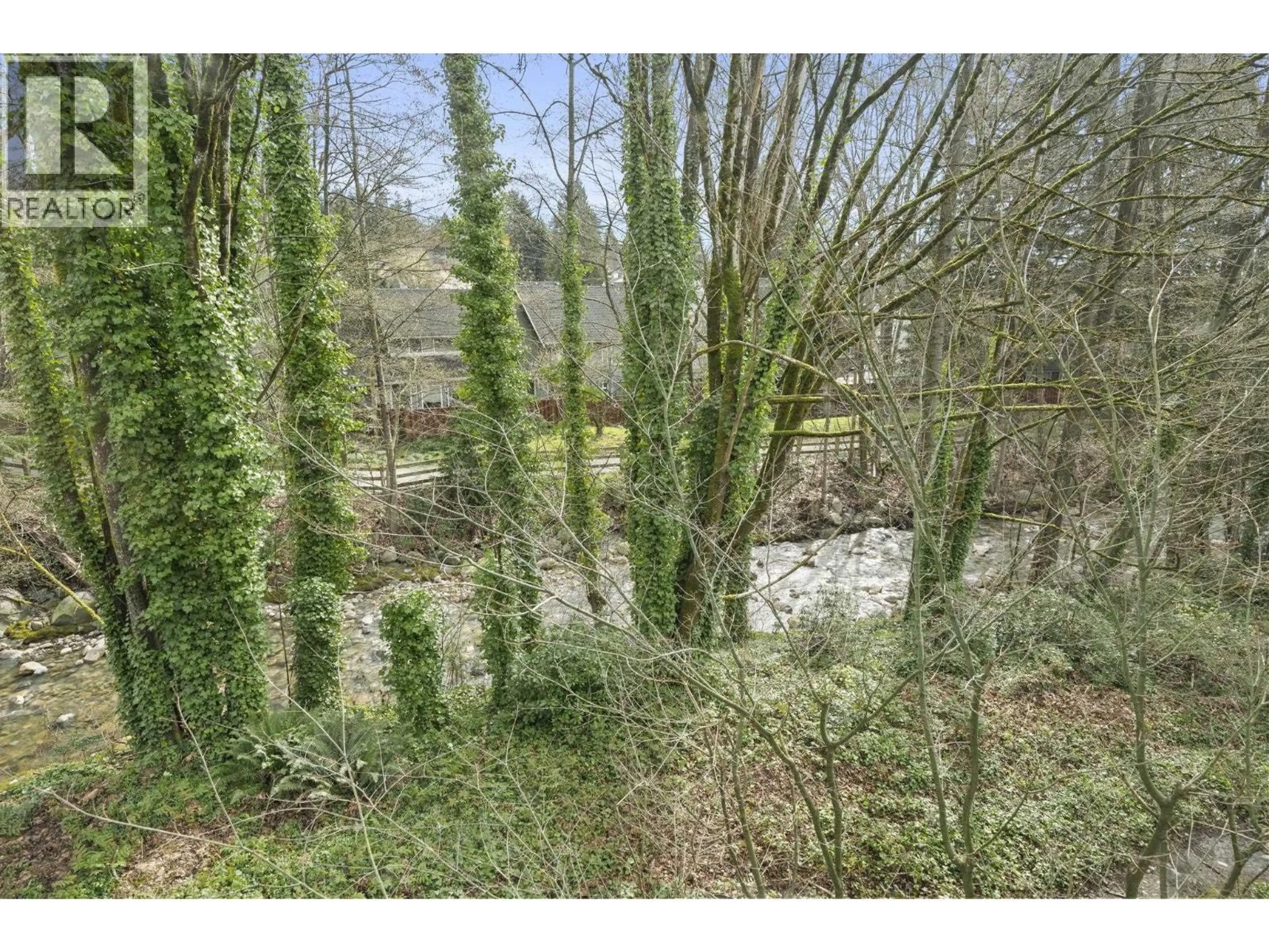 A pic from outside/outdoor area/front of a property/back of a property/a pic from drone, forest/trees view for 304 - 1550 FELL AVENUE AVENUE, North Vancouver British Columbia V7P3E7