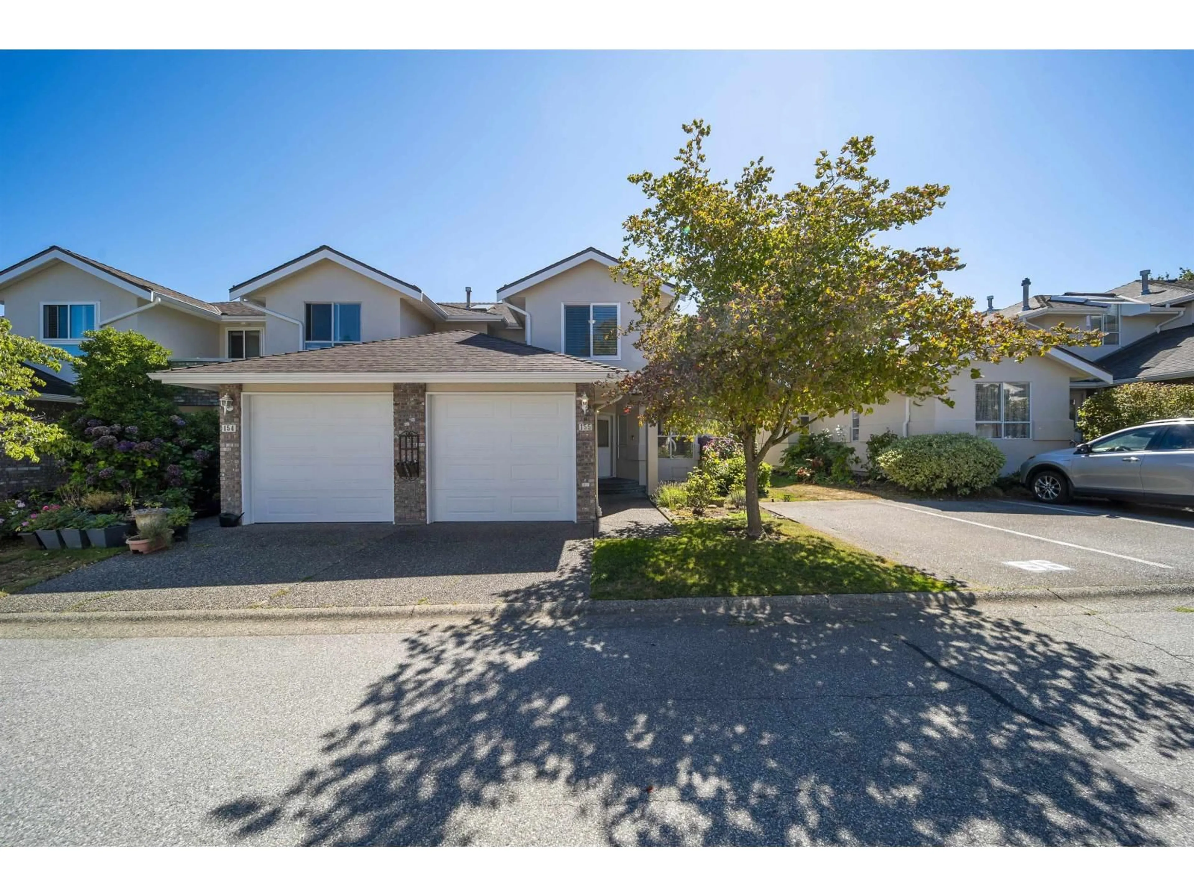 A pic from outside/outdoor area/front of a property/back of a property/a pic from drone, street for 155 - 15550 26 AVENUE, Surrey British Columbia V4P1C6