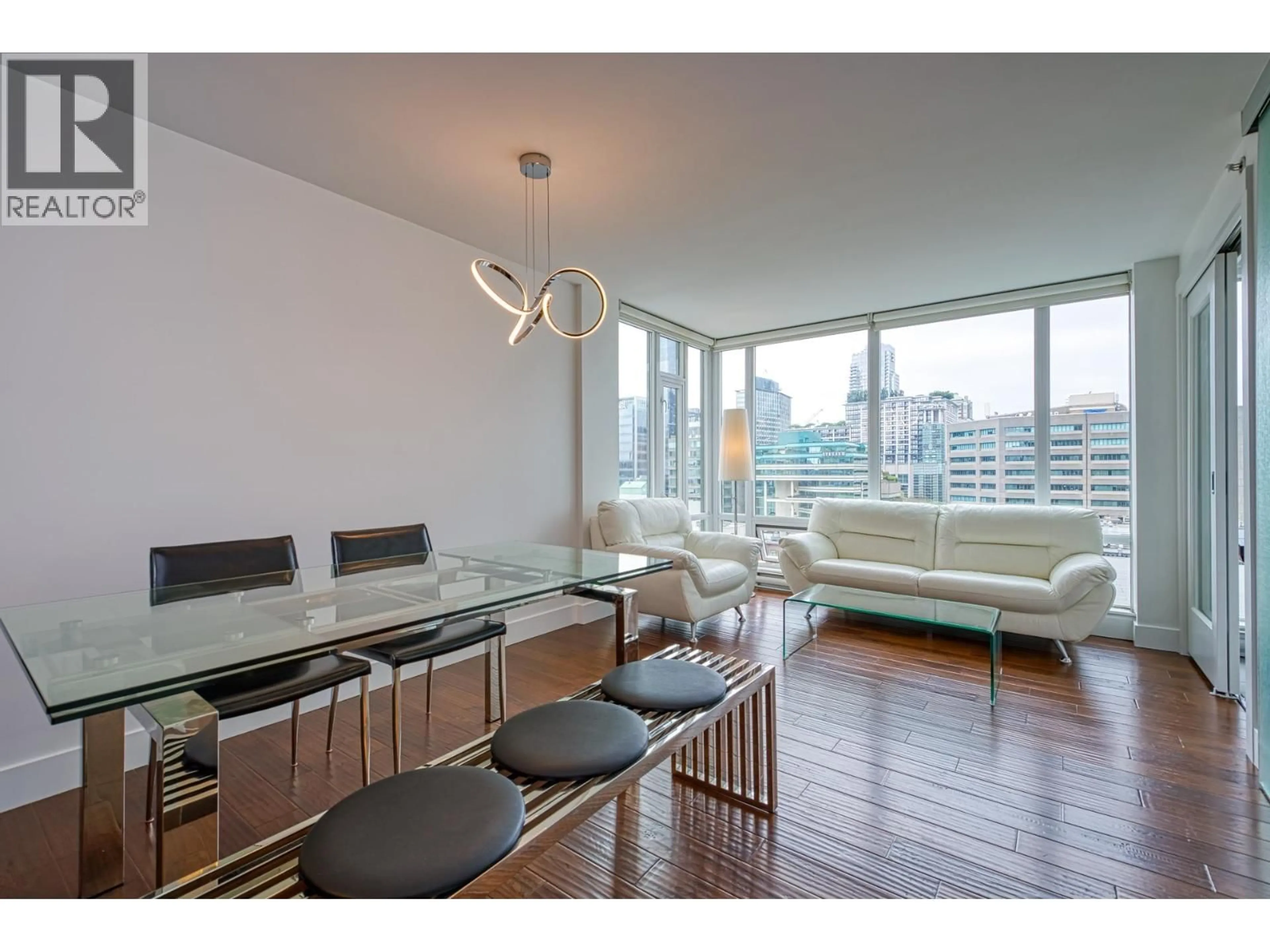 Living room with furniture, wood/laminate floor for 104 - 565 SMITHE STREET, Vancouver British Columbia V6B0E4