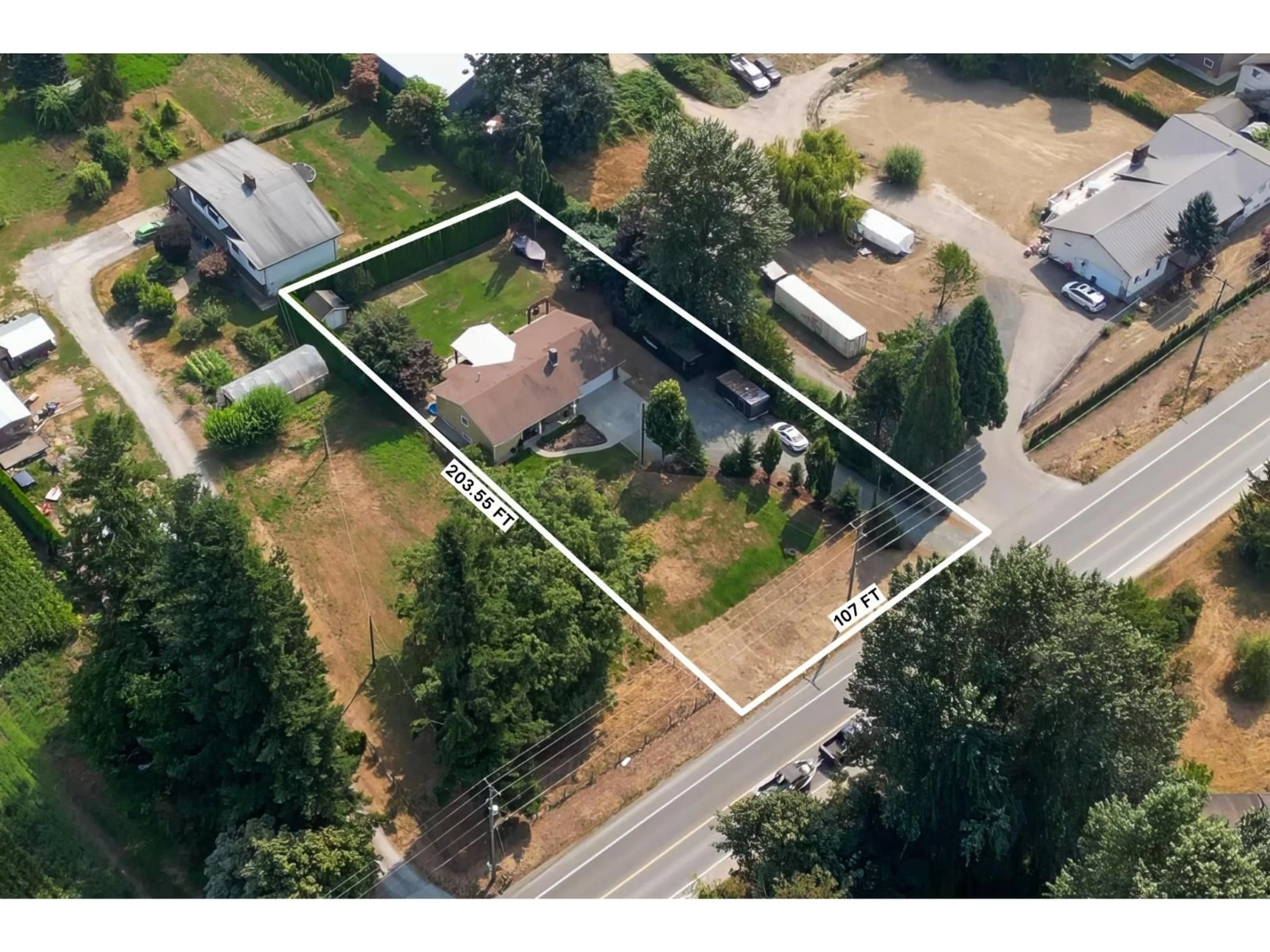 A pic from outside/outdoor area/front of a property/back of a property/a pic from drone, street for 10268 YOUNG ROAD, Chilliwack British Columbia V2P8C2