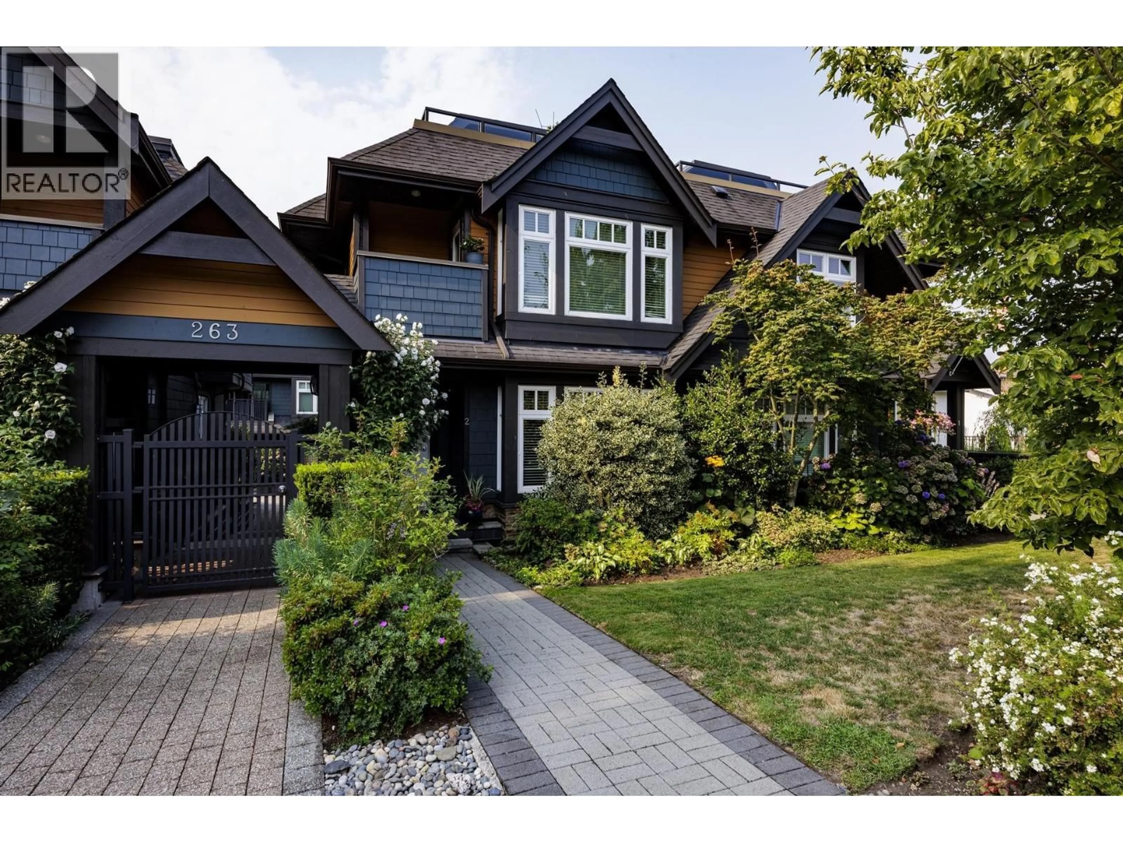 Home with vinyl exterior material, street for 2 - 263 5TH STREET, North Vancouver British Columbia V7L1L8