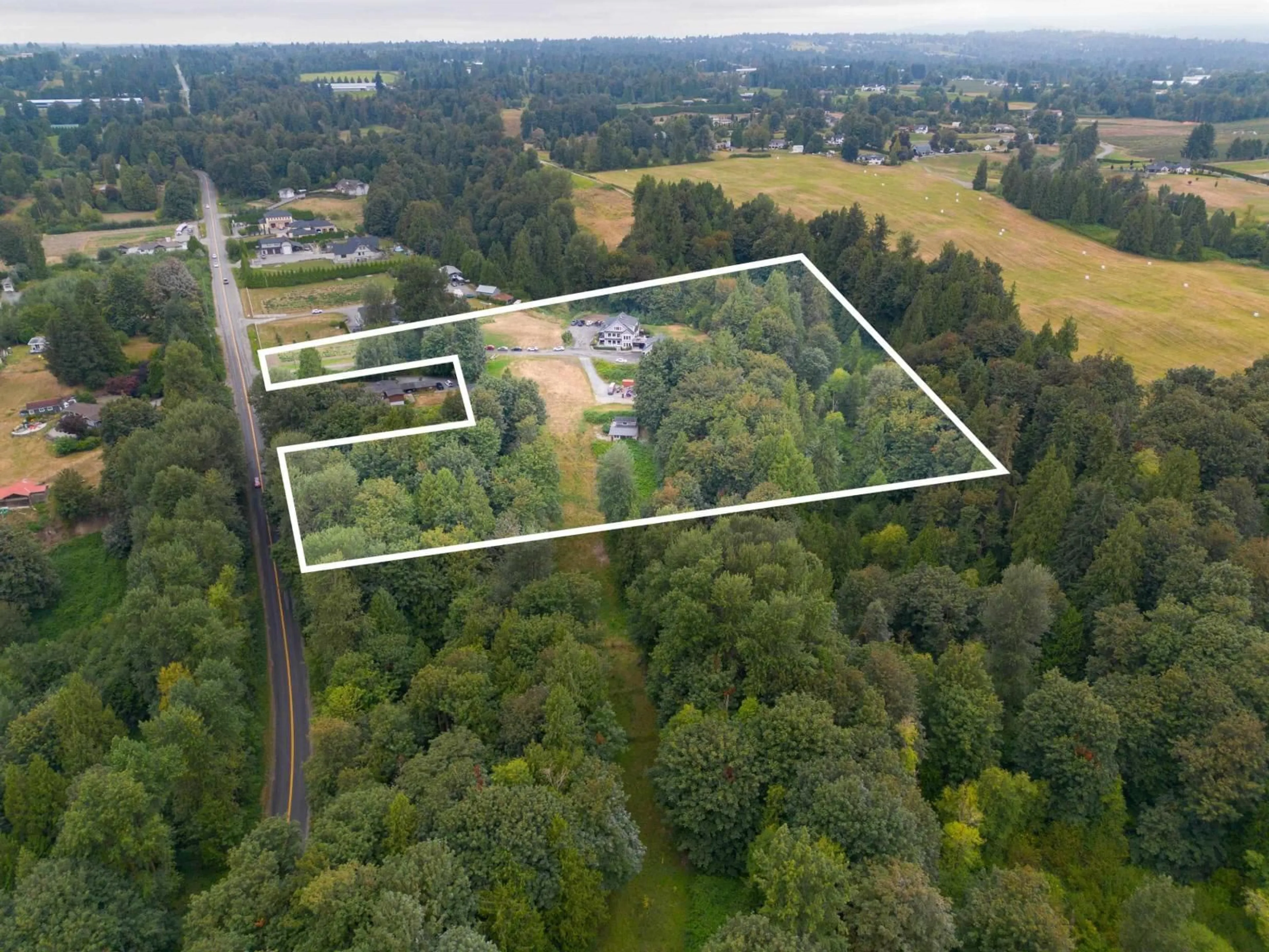 A pic from outside/outdoor area/front of a property/back of a property/a pic from drone, forest/trees view for 31123 HARRIS ROAD, Abbotsford British Columbia V4X1W2