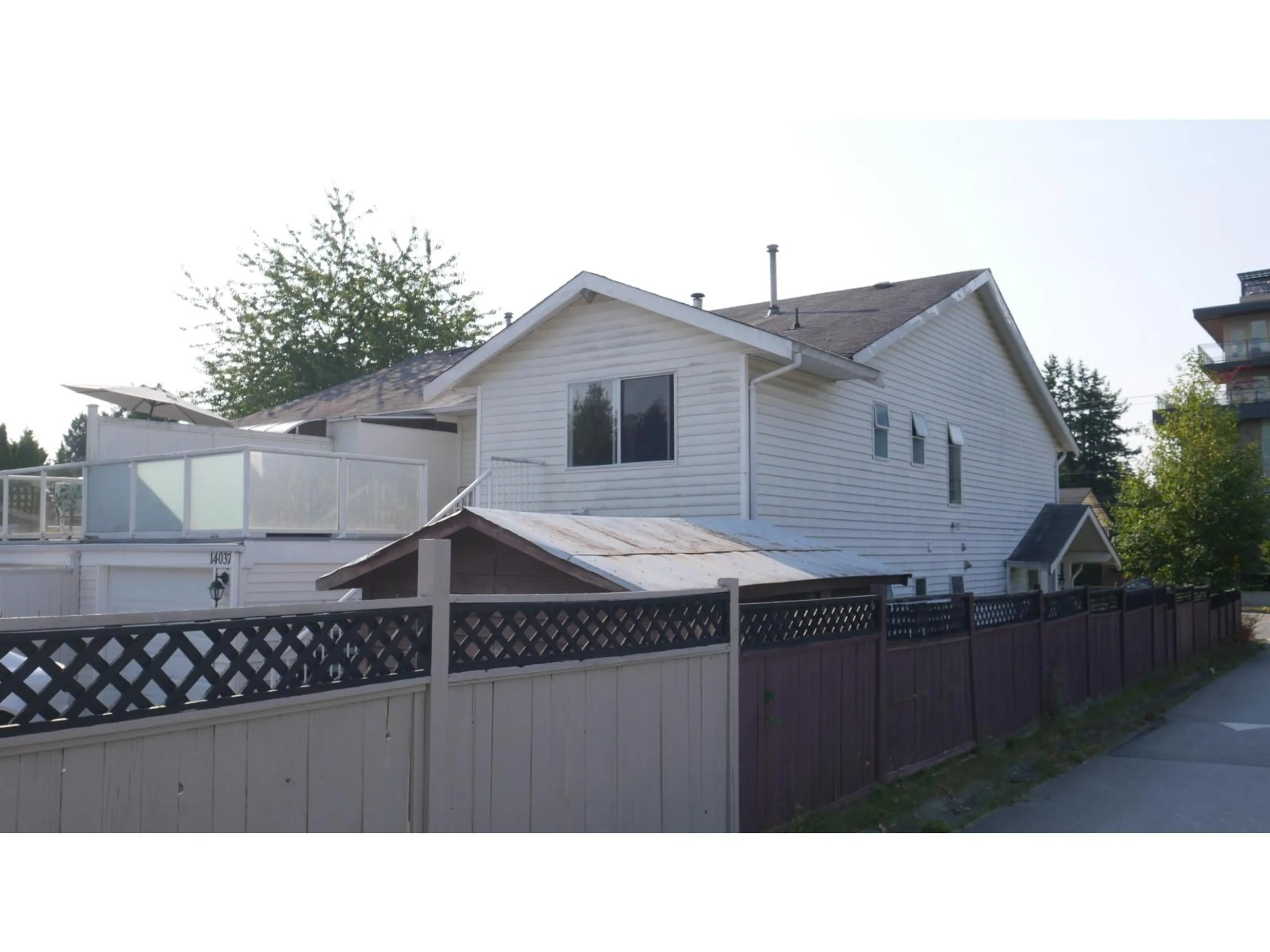 Home with vinyl exterior material, street for 14037 16 AVENUE, Surrey British Columbia V4A1P9