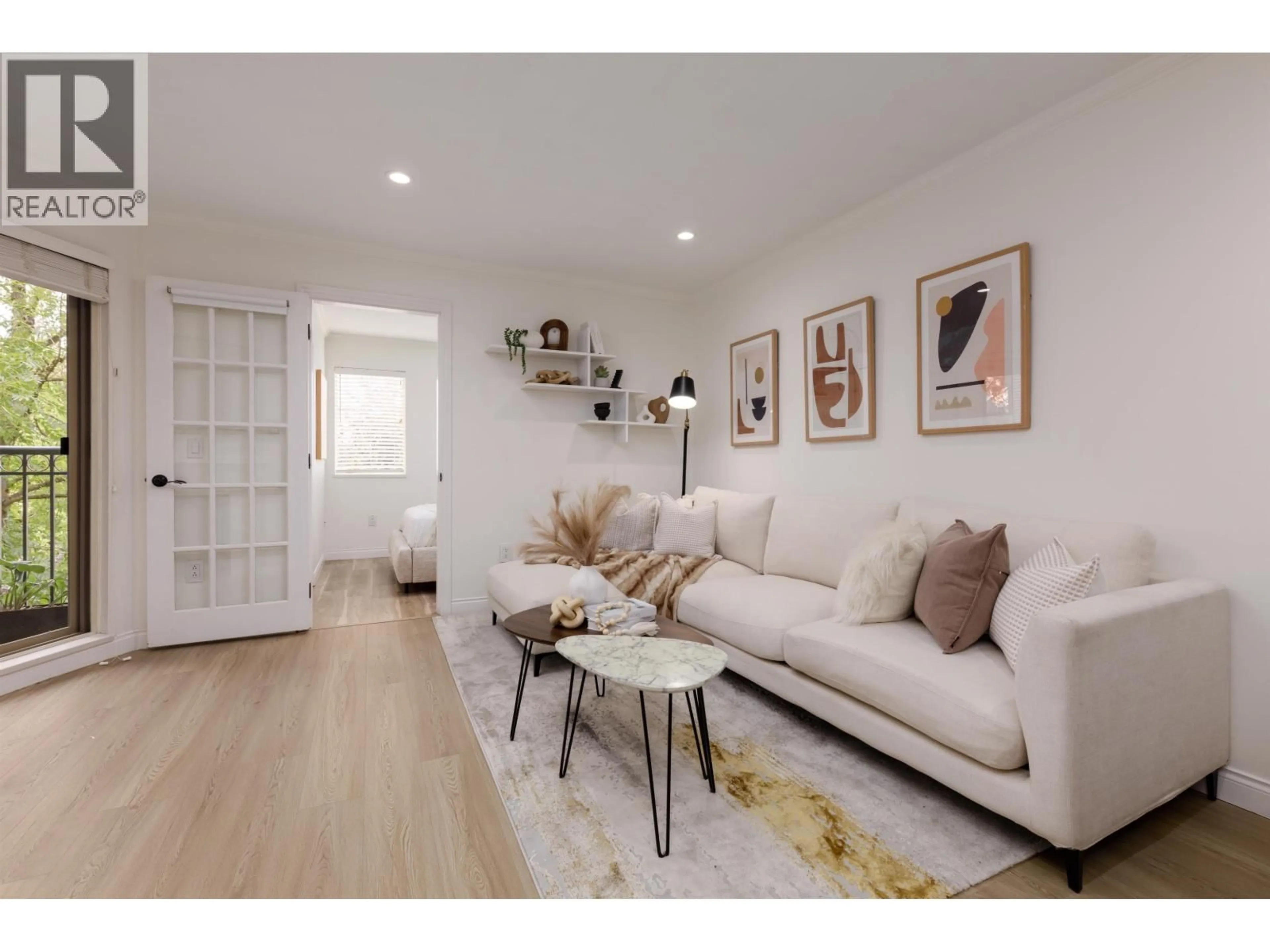Living room with furniture, wood/laminate floor for 305 - 688 16TH AVENUE, Vancouver British Columbia V5T2V4