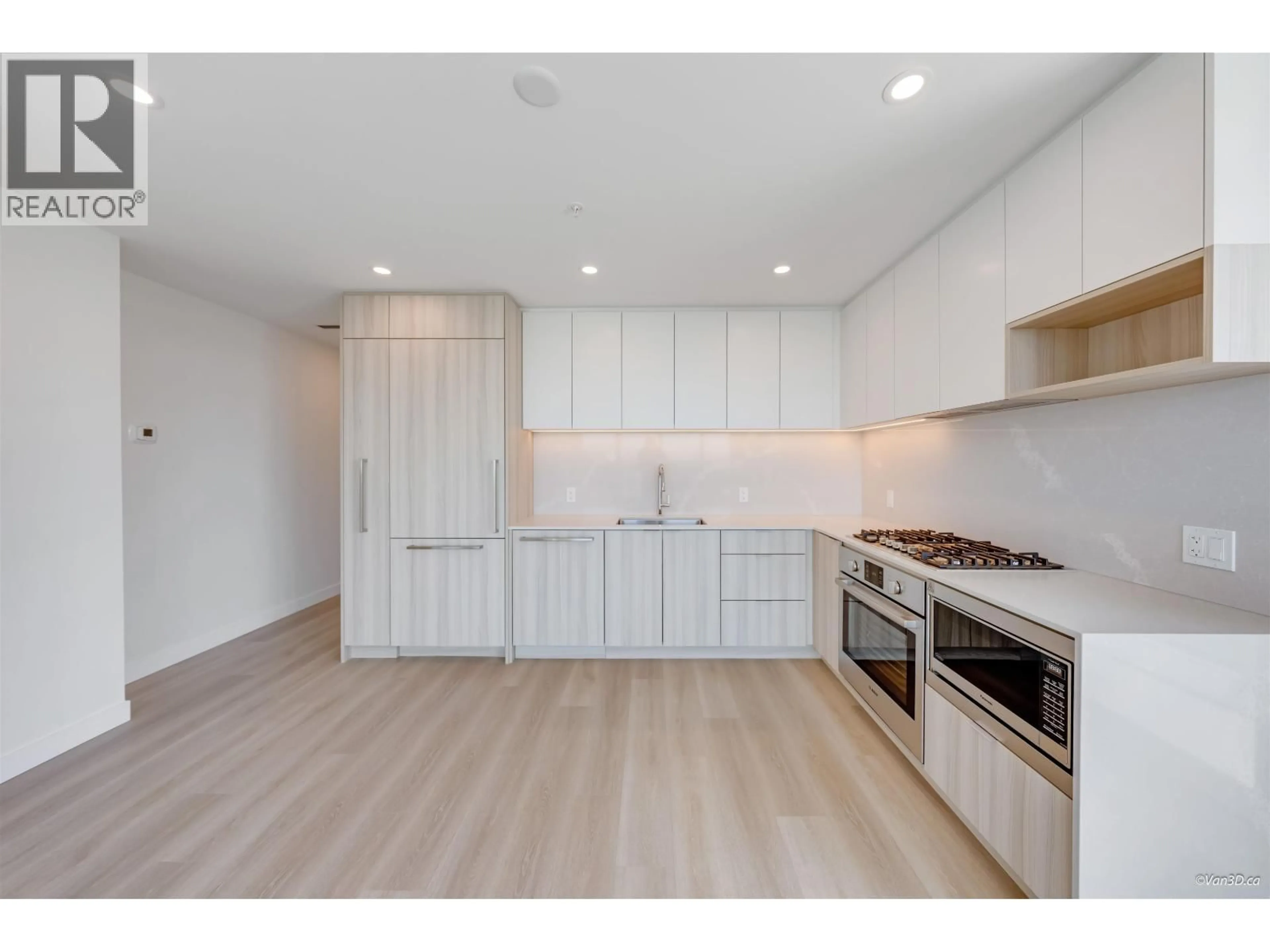 Open concept kitchen, wood/laminate floor for 2806 - 6087 WILSON AVENUE, Burnaby British Columbia V5H0M1