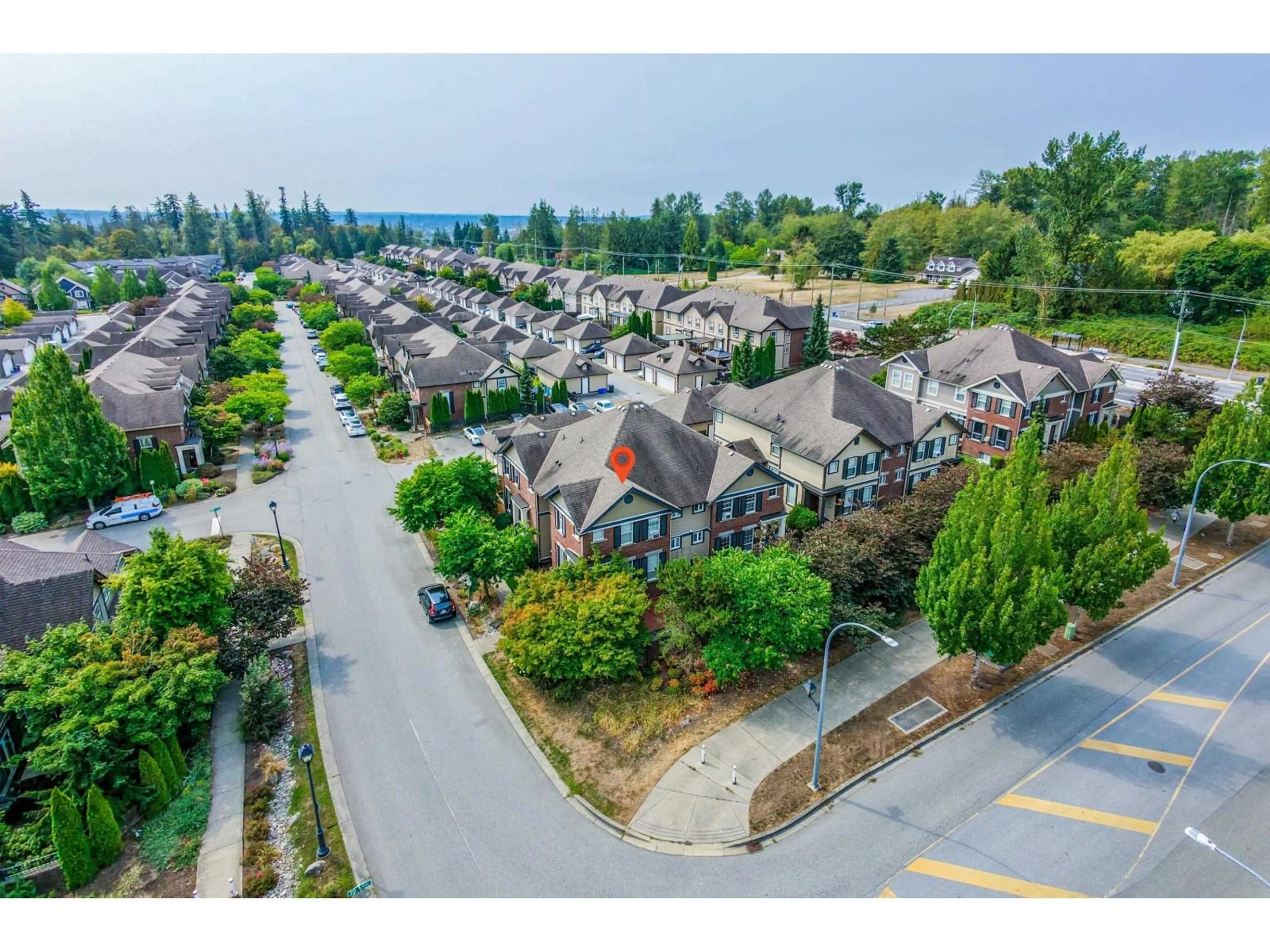 A pic from outside/outdoor area/front of a property/back of a property/a pic from drone, mountain view for 1 - 20832 70 AVENUE, Langley British Columbia V2Y0G1