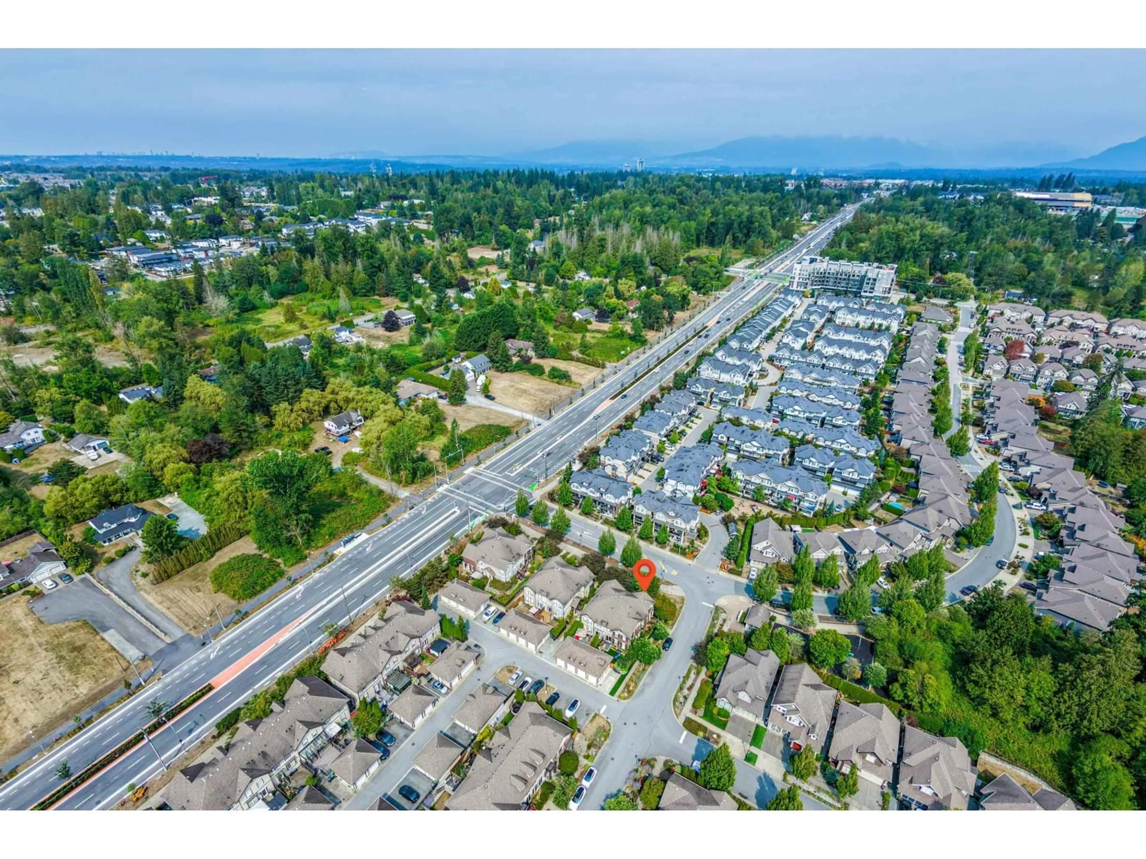 A pic from outside/outdoor area/front of a property/back of a property/a pic from drone, street for 1 - 20832 70 AVENUE, Langley British Columbia V2Y0G1