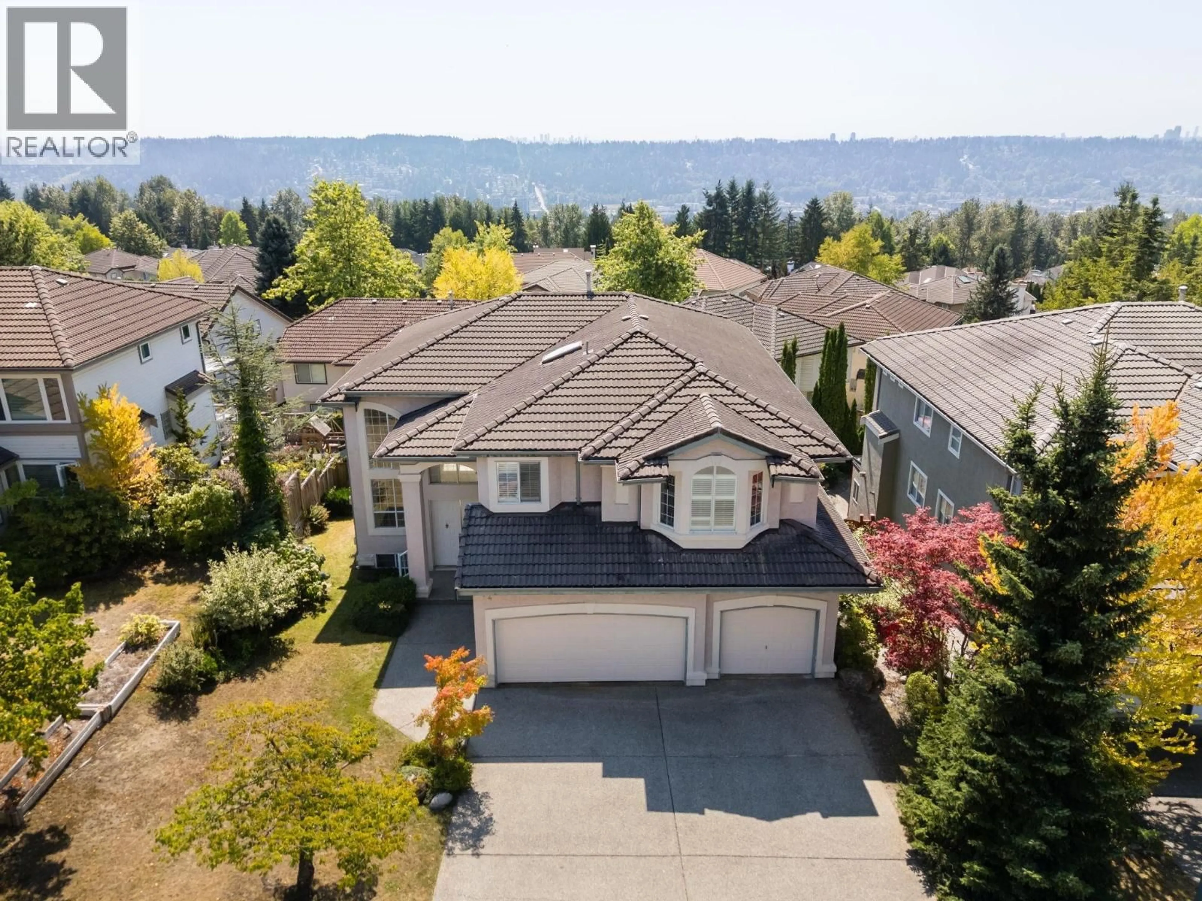A pic from outside/outdoor area/front of a property/back of a property/a pic from drone, water/lake/river/ocean view for 214 ASPENWOOD DRIVE, Port Moody British Columbia V3H5A7